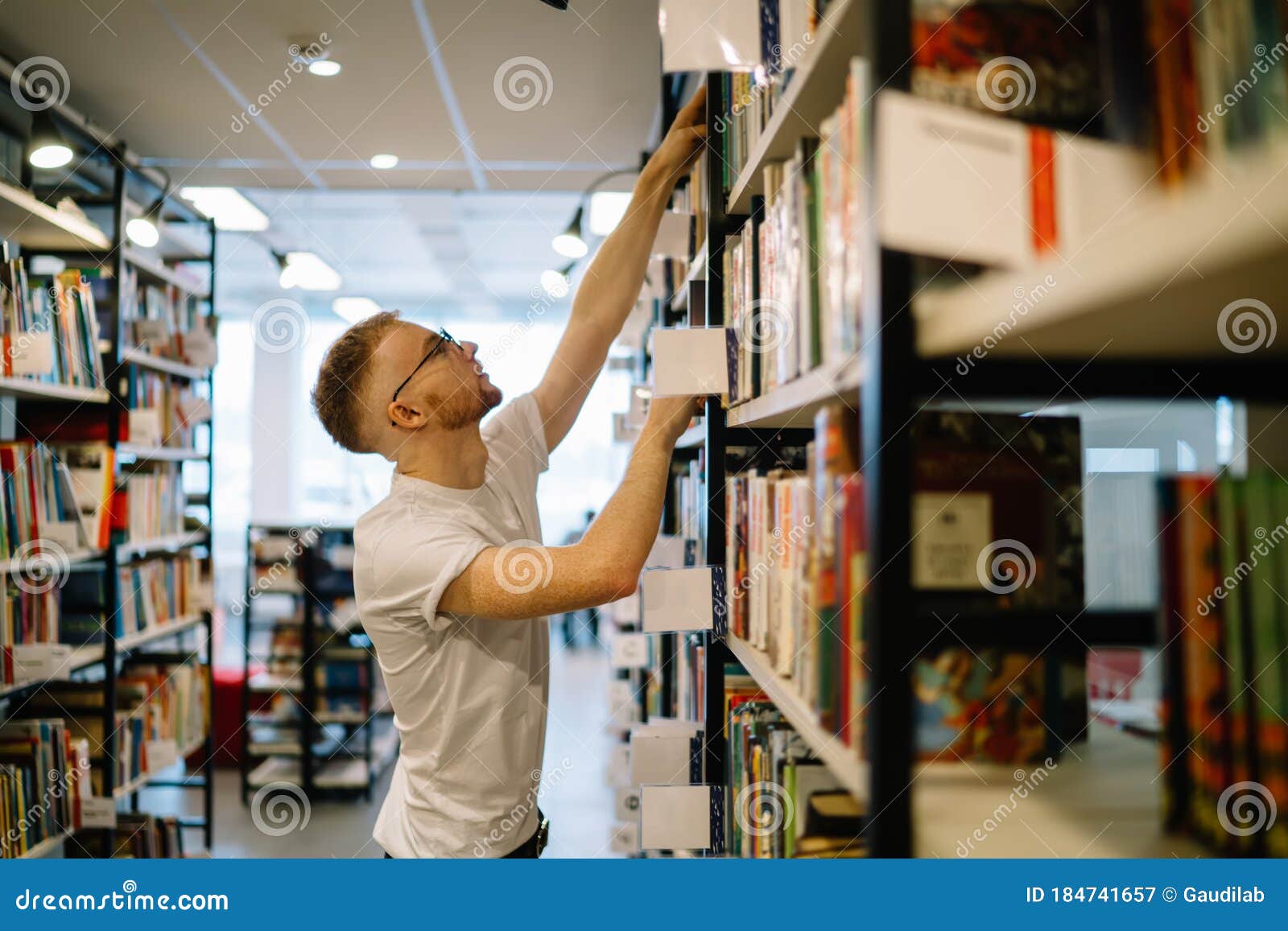 Reaching Top Shelf Stock Photos - Free & Royalty-Free Stock Photos from  Dreamstime