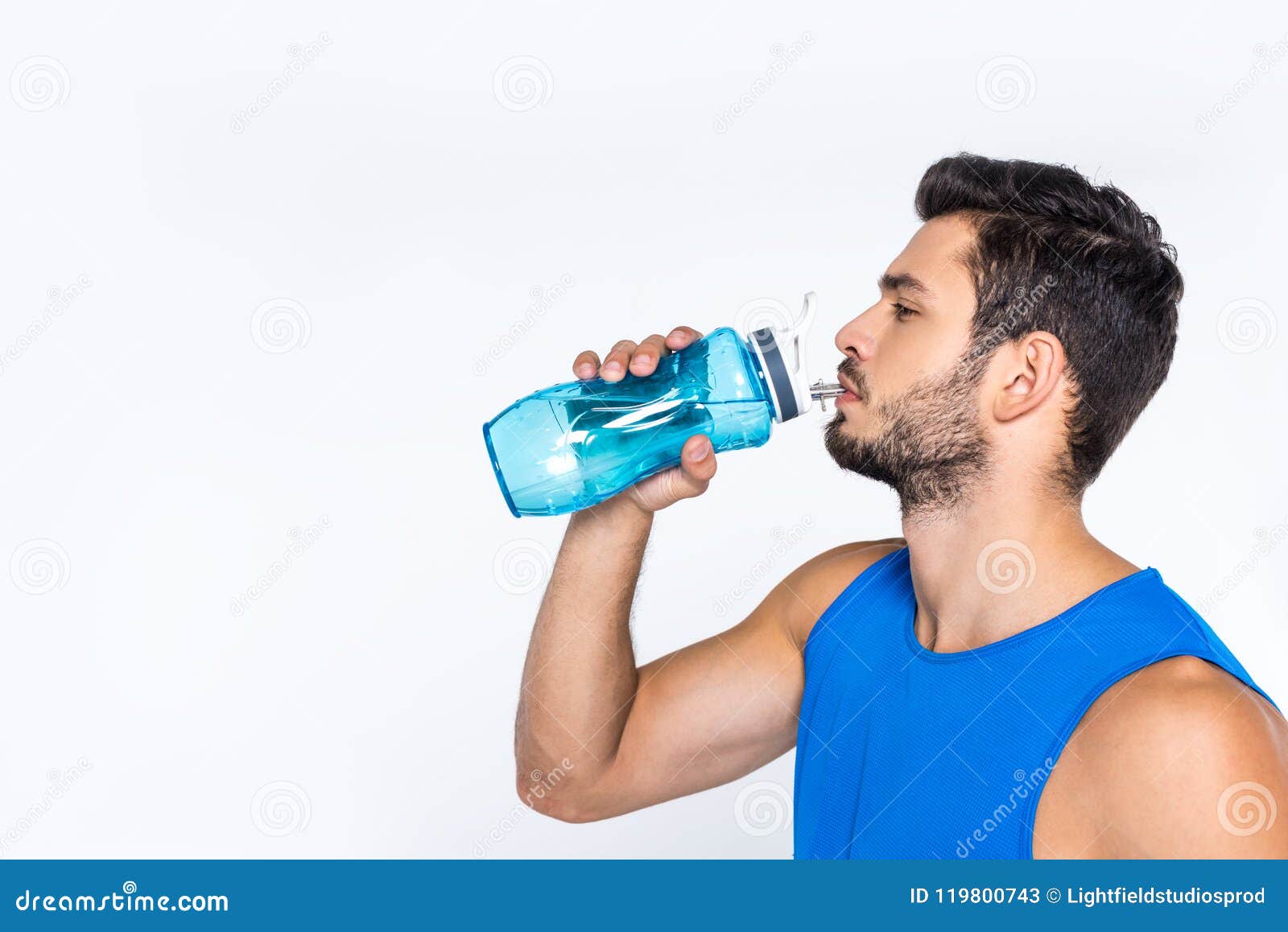 Man drinking water from a big bottle Stock Photo