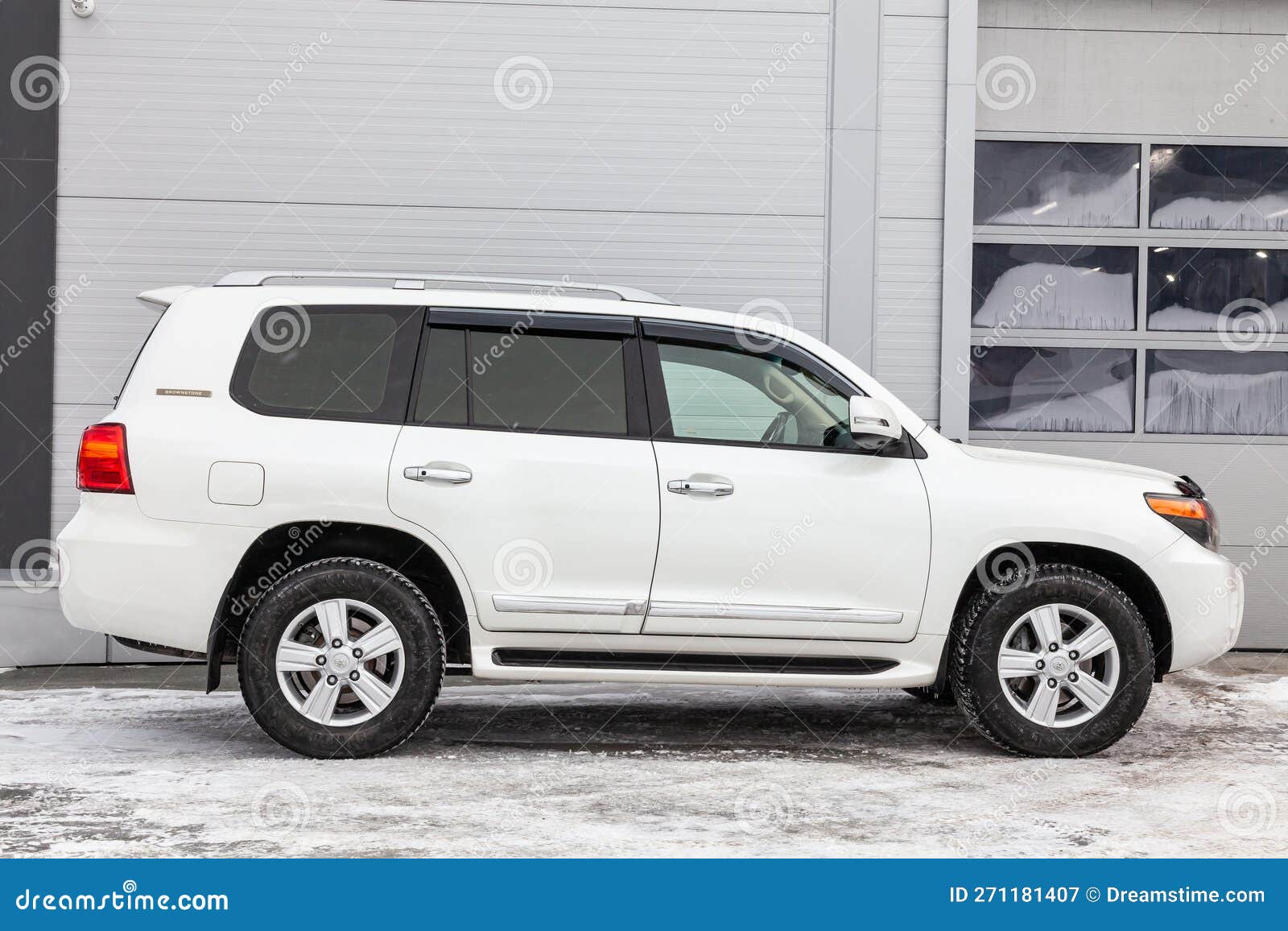 Side View of Toyota Land Cruiser 200 J200 2013 Year White Color after