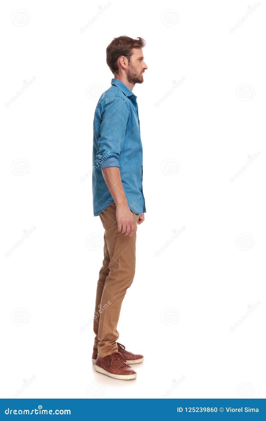 Vintage Photograph. Fat man standing on scale wearing dress shirt and tie, side  view - SuperStock