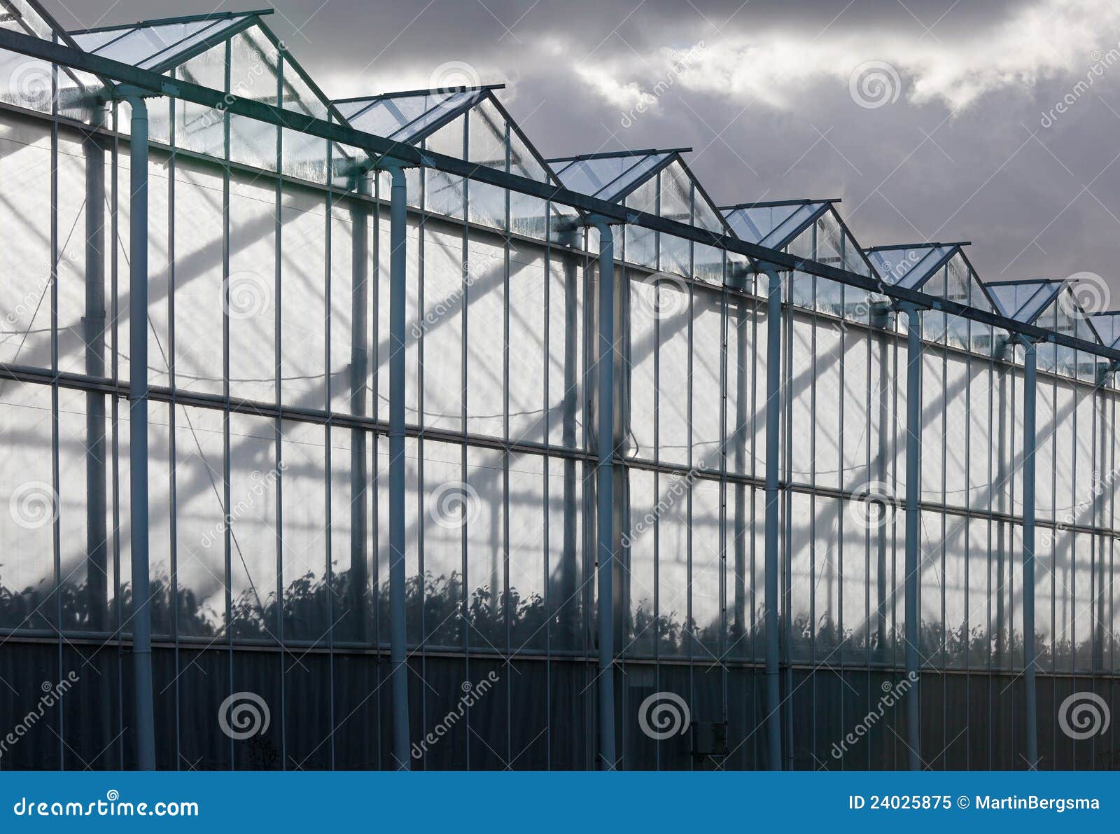 Sideview of a Greenhouse with a Cloudy Sky Stock Image Image of
