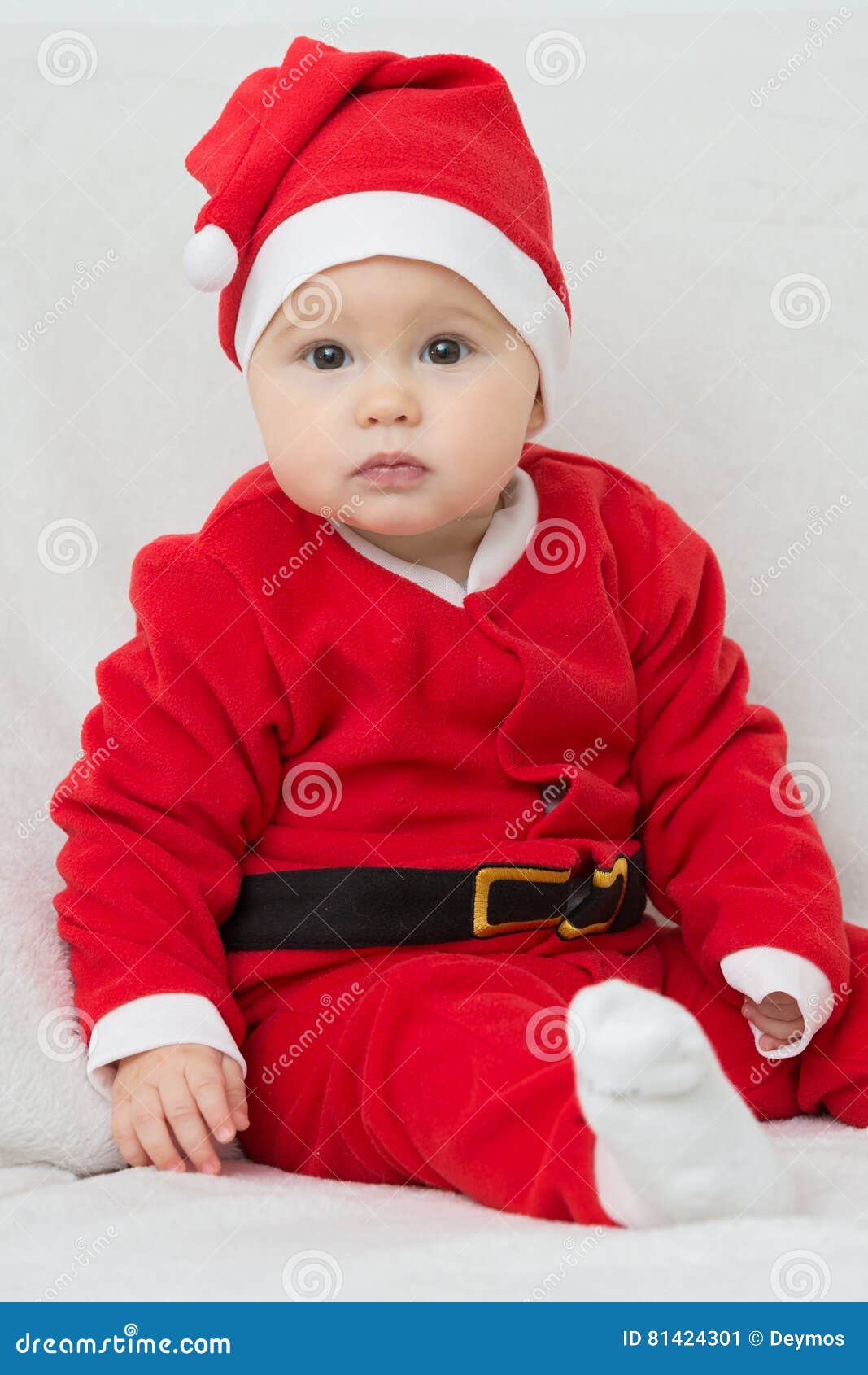 Siete Meses Del Bebé En El Vestido De Santa Claus Imagen de archivo -  Imagen de manos, adorable: 81424301