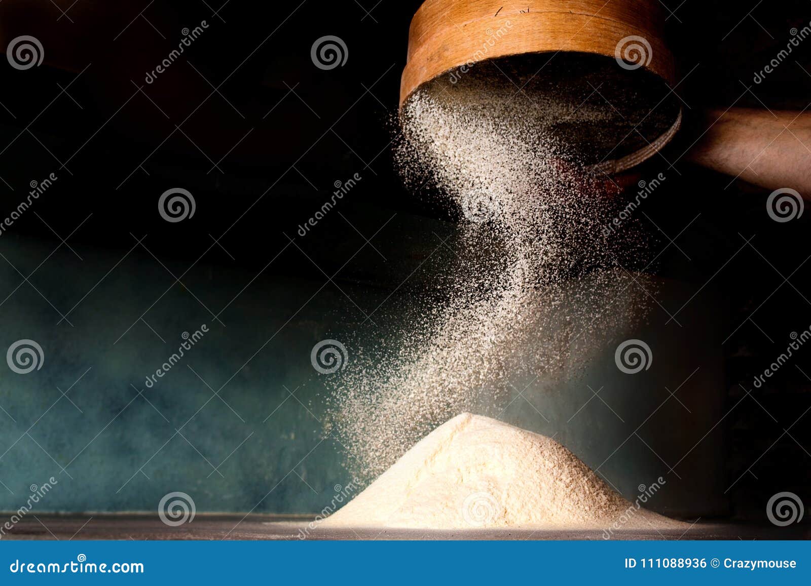 sifting flour from old sieve.