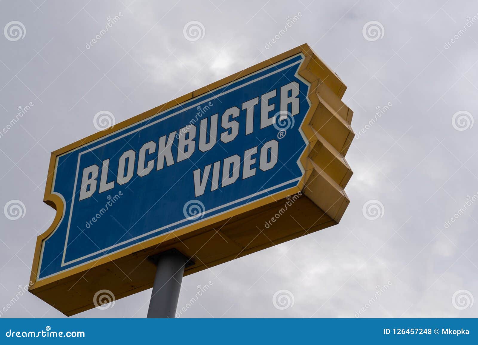 Sign for Blockbuster Video Movie Rental Store. Close Up View, Overcast