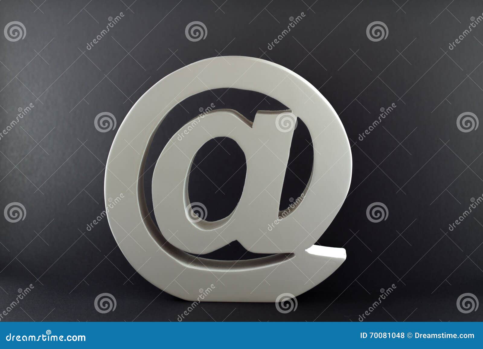 At Sign with Dark Background Stock Photo Image of object, address