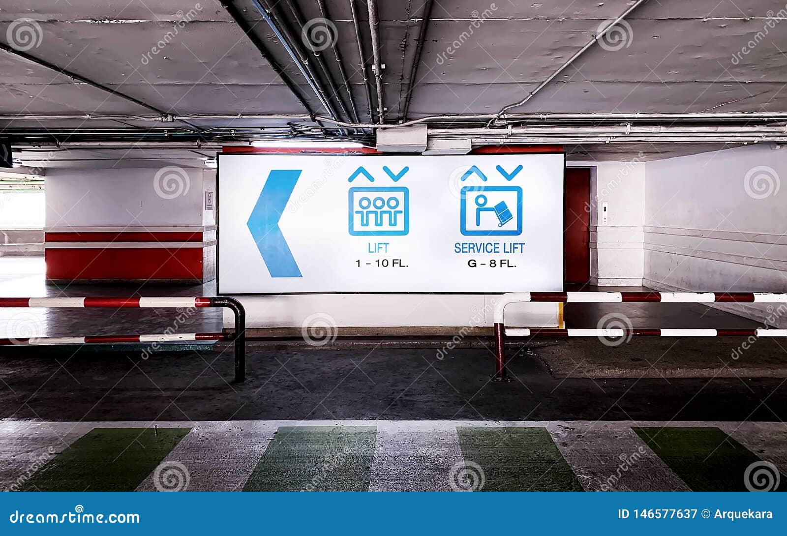 The Sign of Elevator in the Underground Parking Lot Stock Image Image