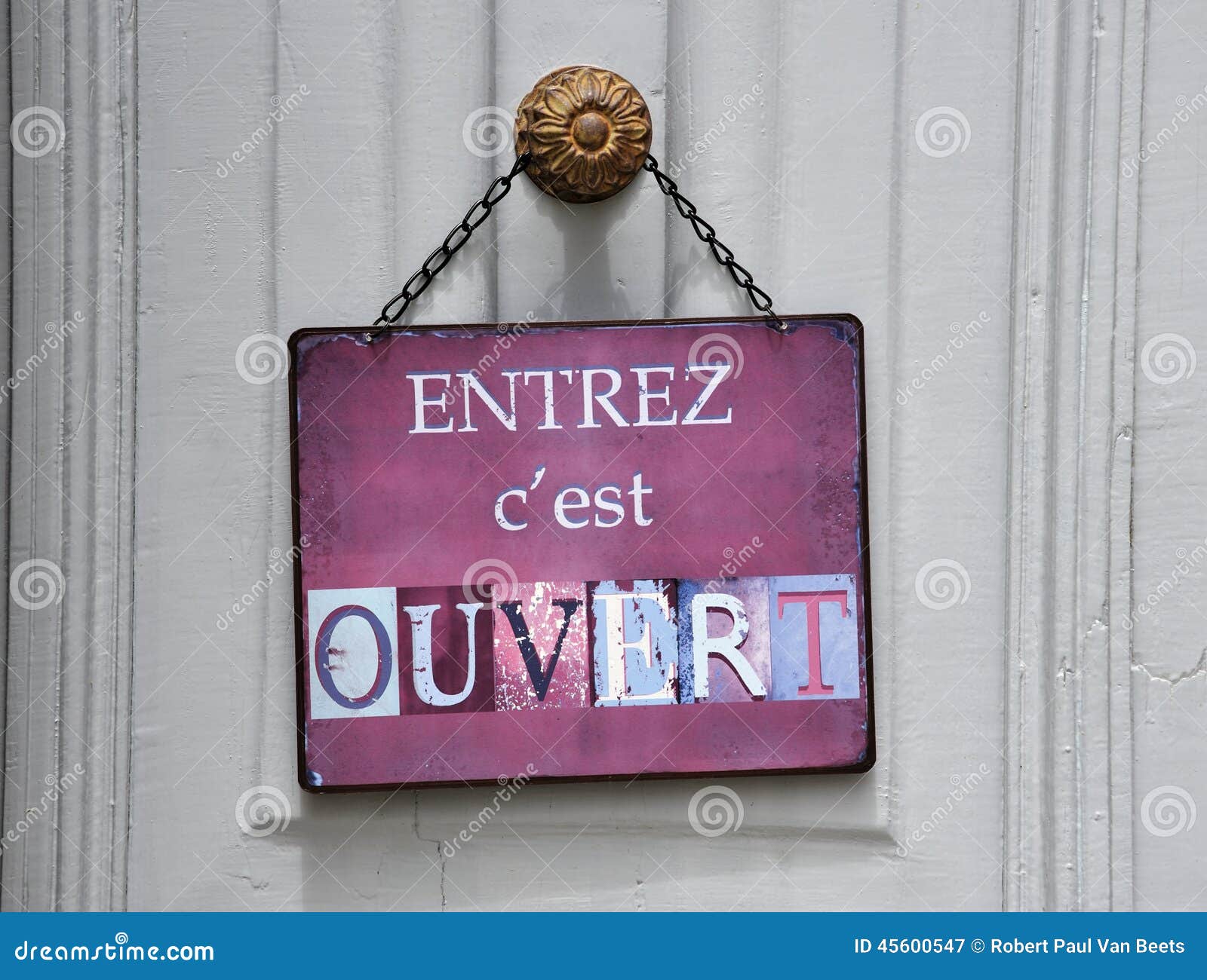 Sign at the entrance of a restaurant saying in French - Ouvert - meaning in  English - Open Stock Photo - Alamy