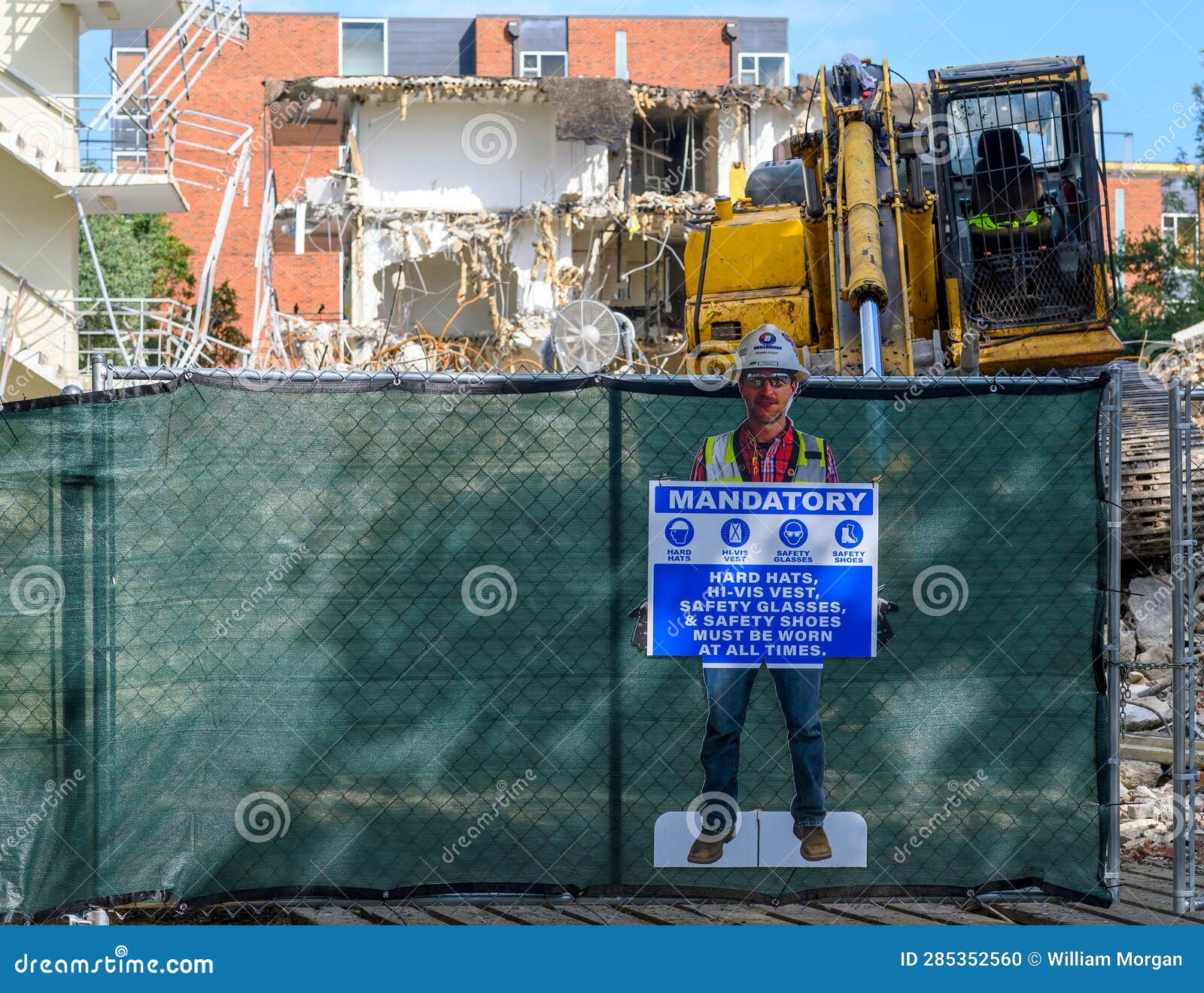 Sign with Mandatory Safety Rules at Demolition Site Editorial Image
