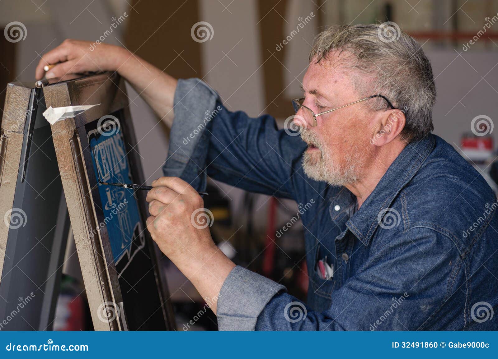 Sign painter at work stock photo. Image of creative, intricate 32491860