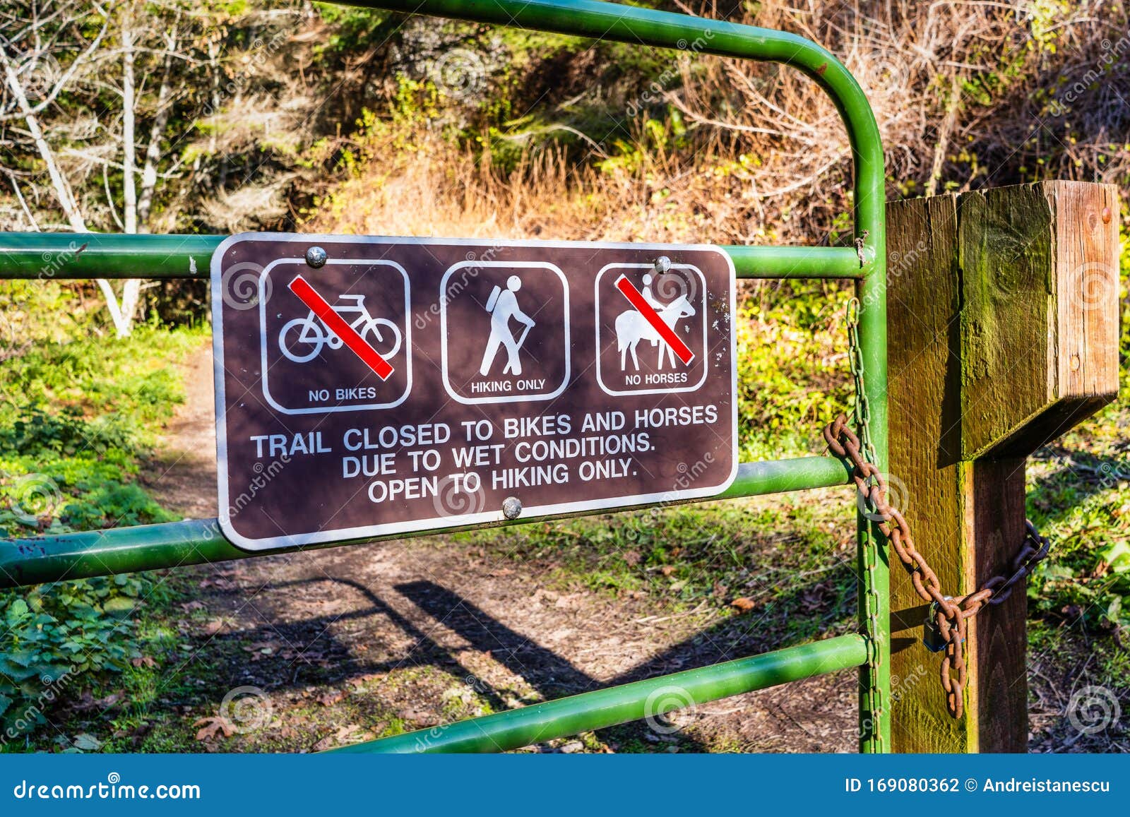 sign posted at the entrance on one of the trails opened only to hiking and warning that it is closed to bikes and horses due to
