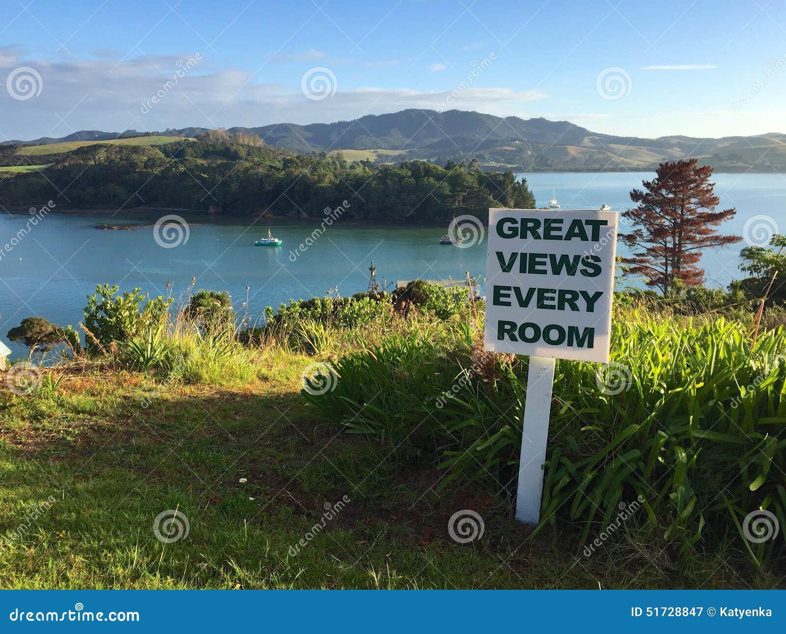 sign promoting tourism in mangonui harbour, northland, new zealand