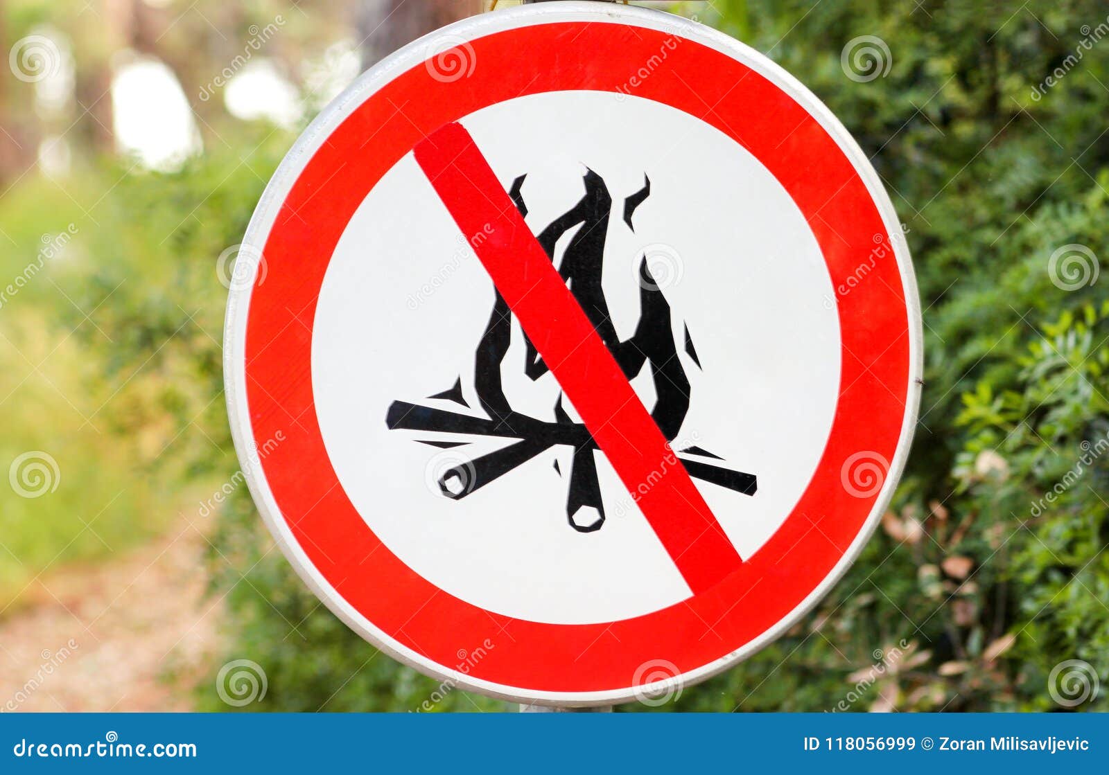 sign or  no campfire, do not light a fire. no campfires sign, in nature by sea. no open flame sign.