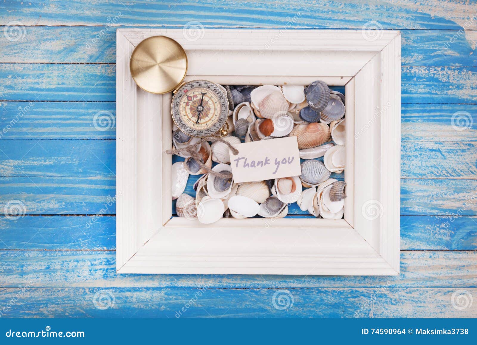 Sign Thank You and Compass in a White Frame Vintage Style Stock Photo