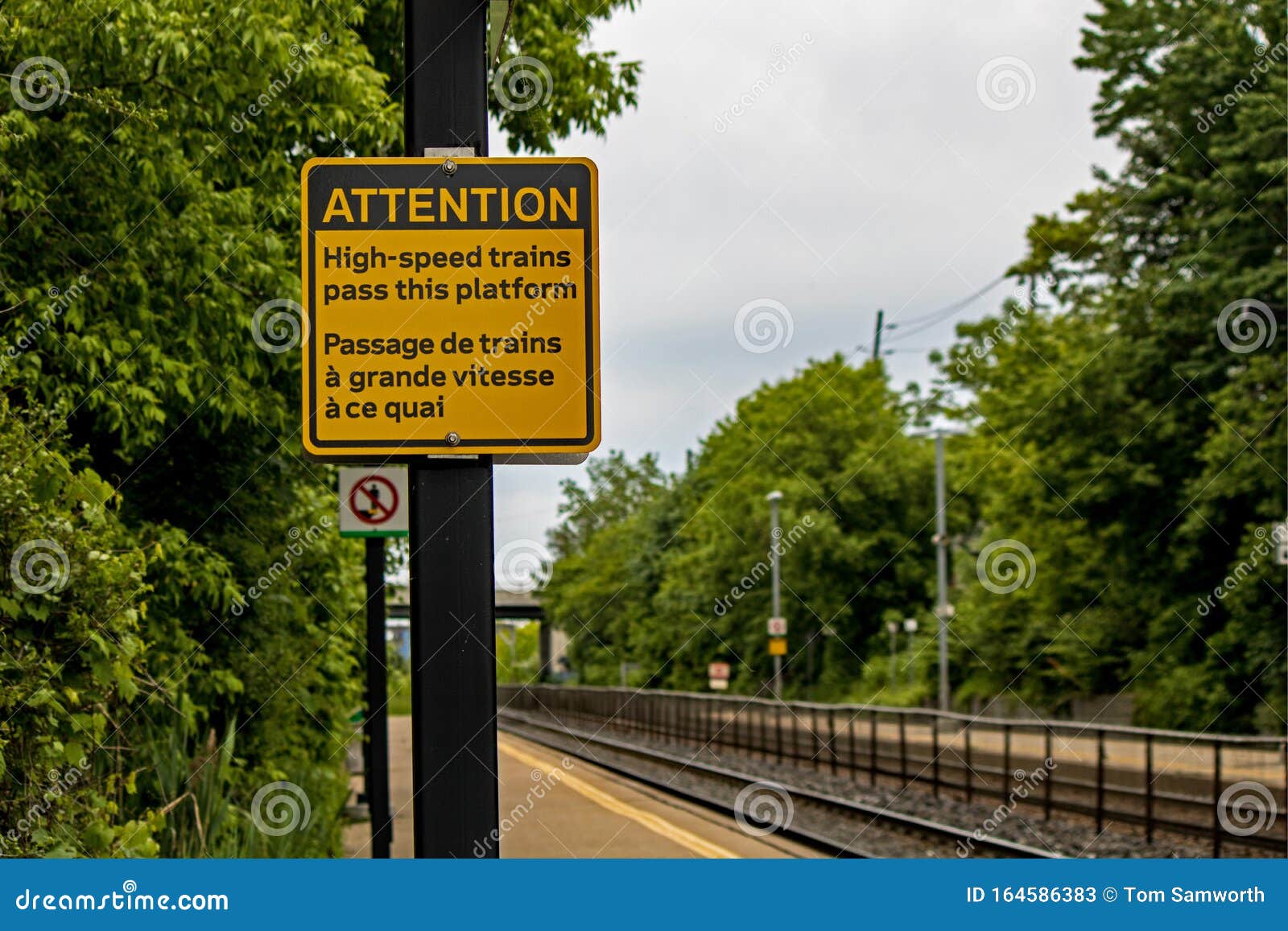 High Speed Train Warning Sign at Long Branch GO Station Stock