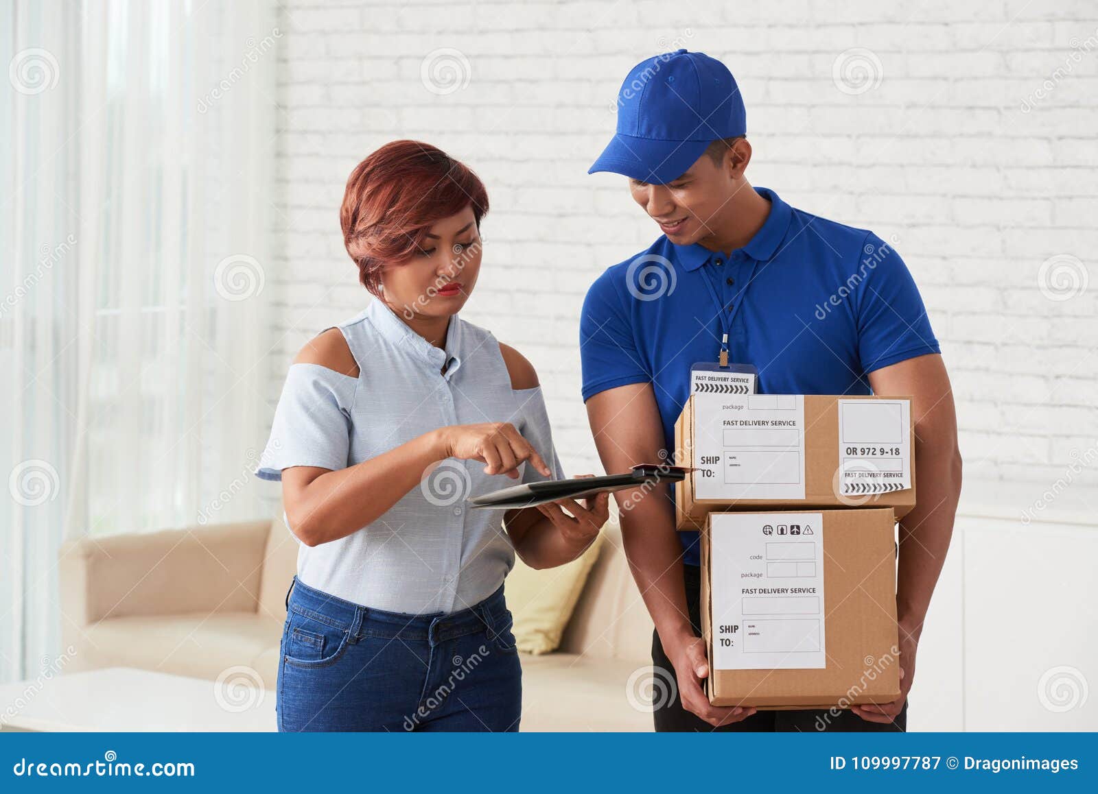 Signing delivery document stock image. Image of courier 109997787