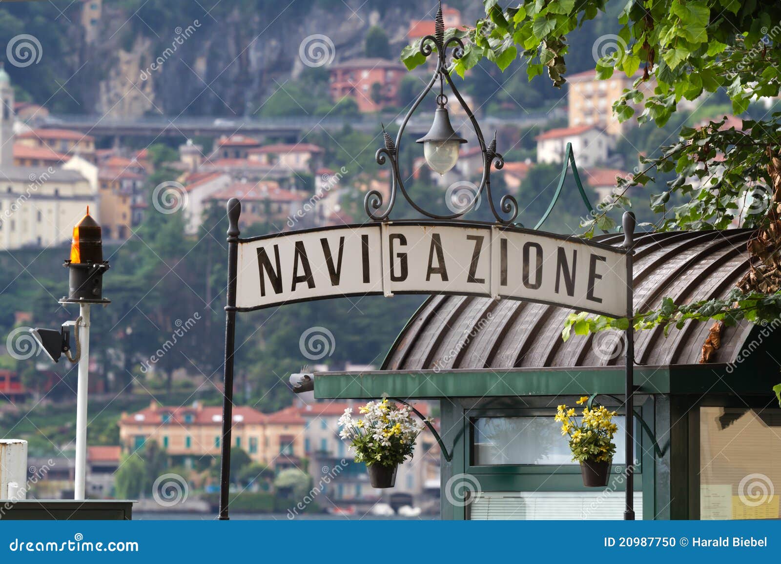 signpost for a landing stage at lake como, italy