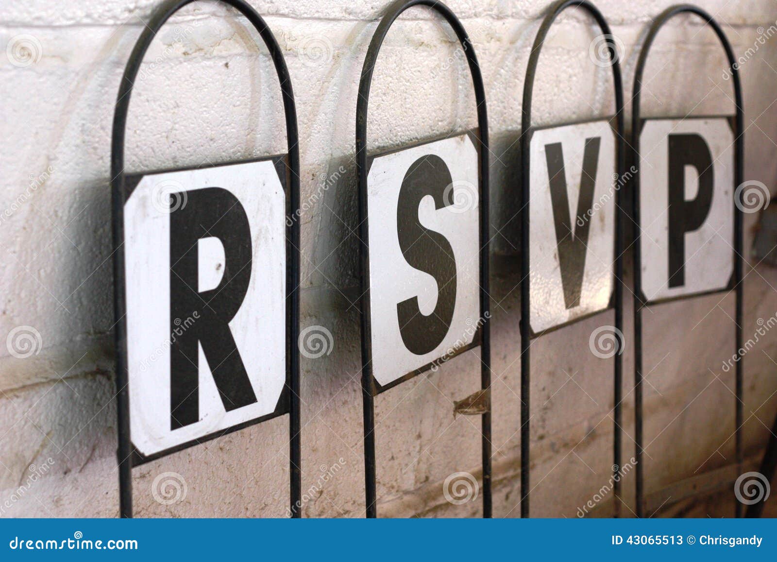 a signpost with letters spelling rsvp respondez s'il vous plait