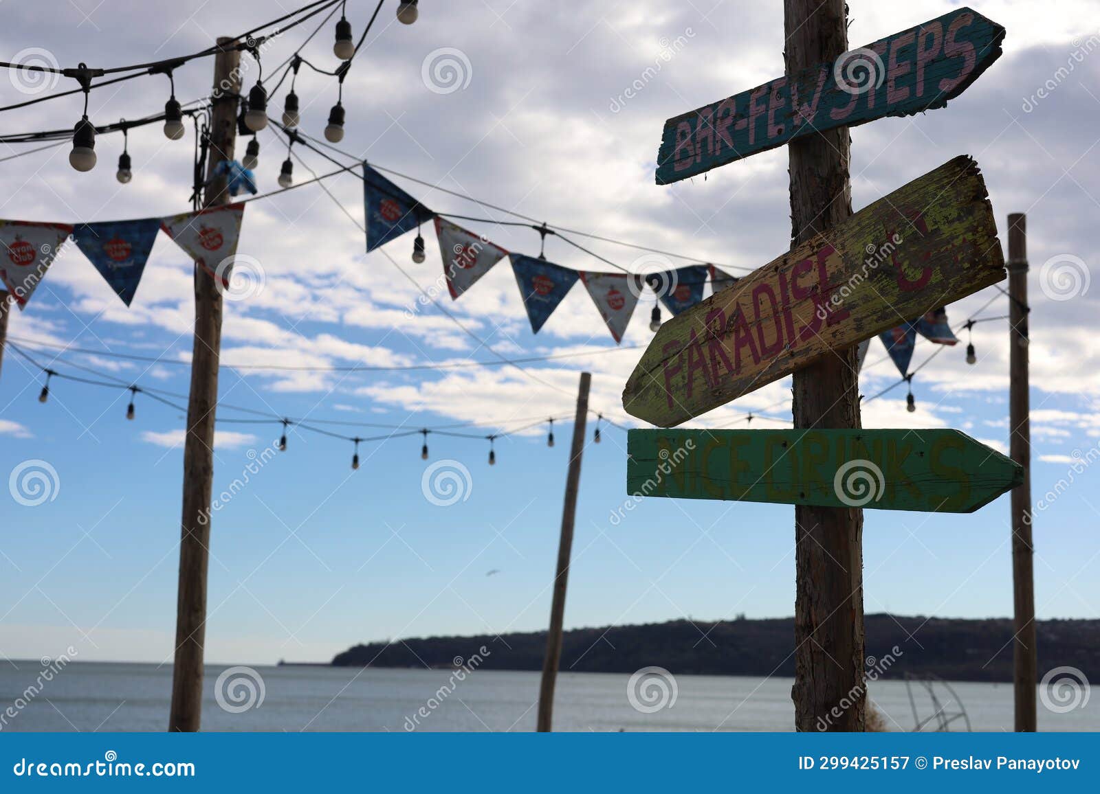 Signs on a Beach Pointing in Different Directions Stock Image Image