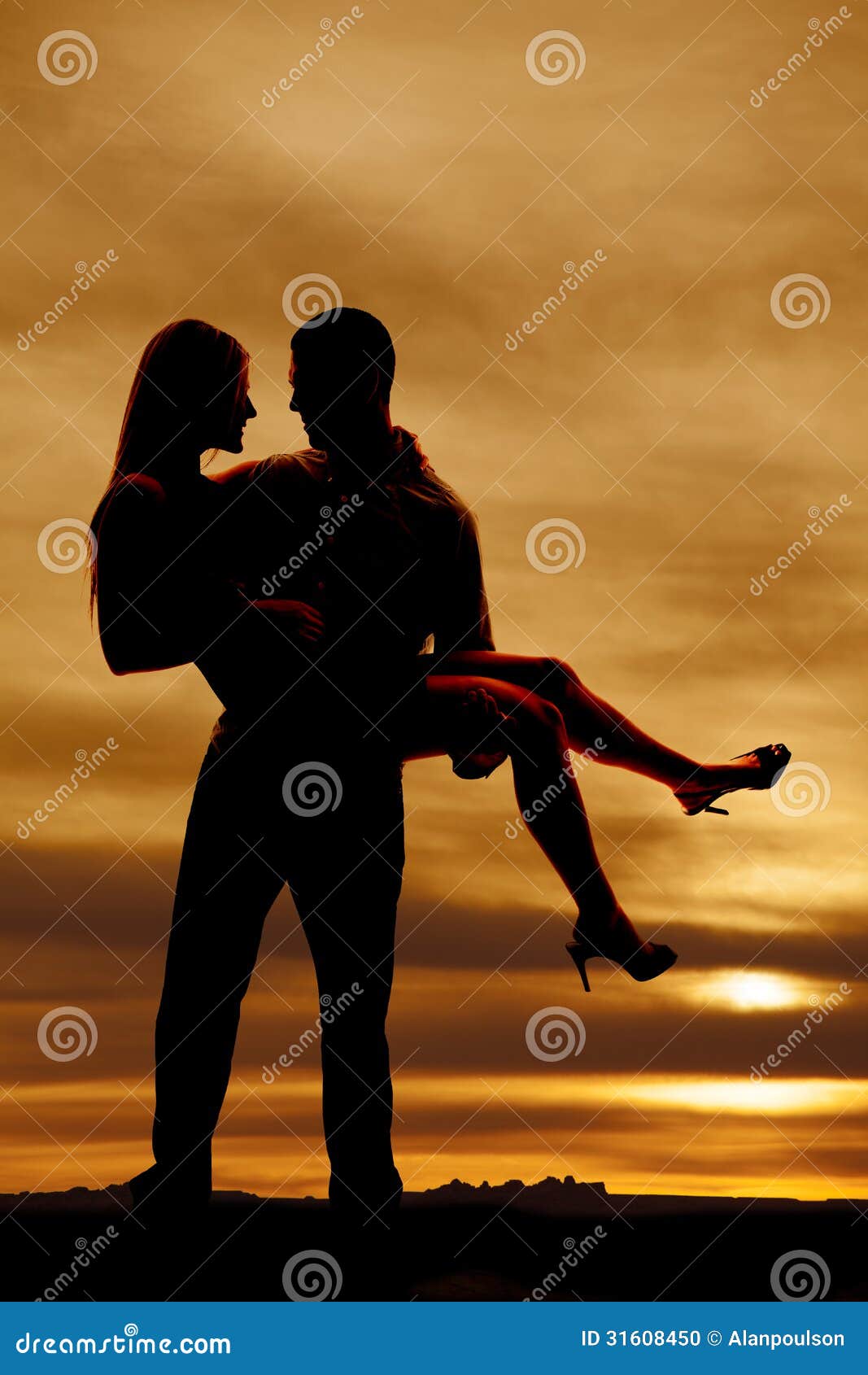 Sihouette Of Man Holding Woman Looking At Each Other Stock Sihouette Of Man Holding Woman Looking At Each Other Stock