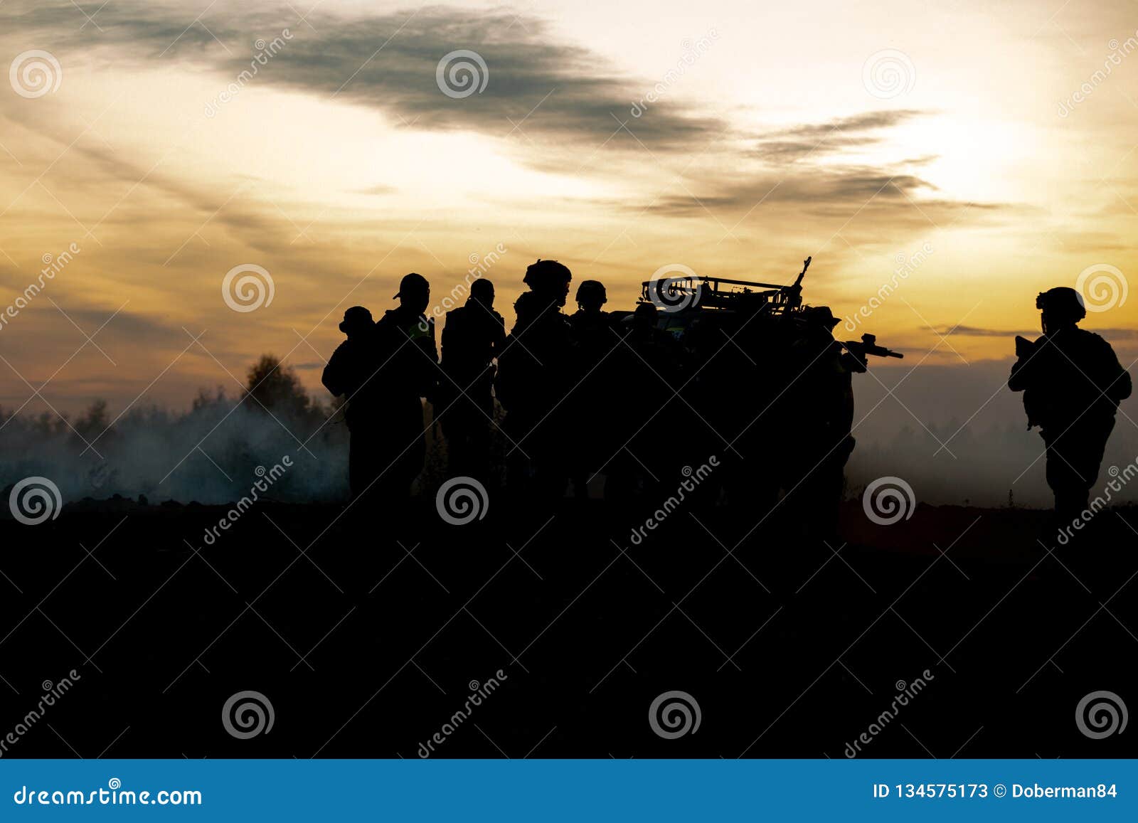 silhouette action soldiers walking hold weapons the background is smoke and sunset and white balance ship effect dark