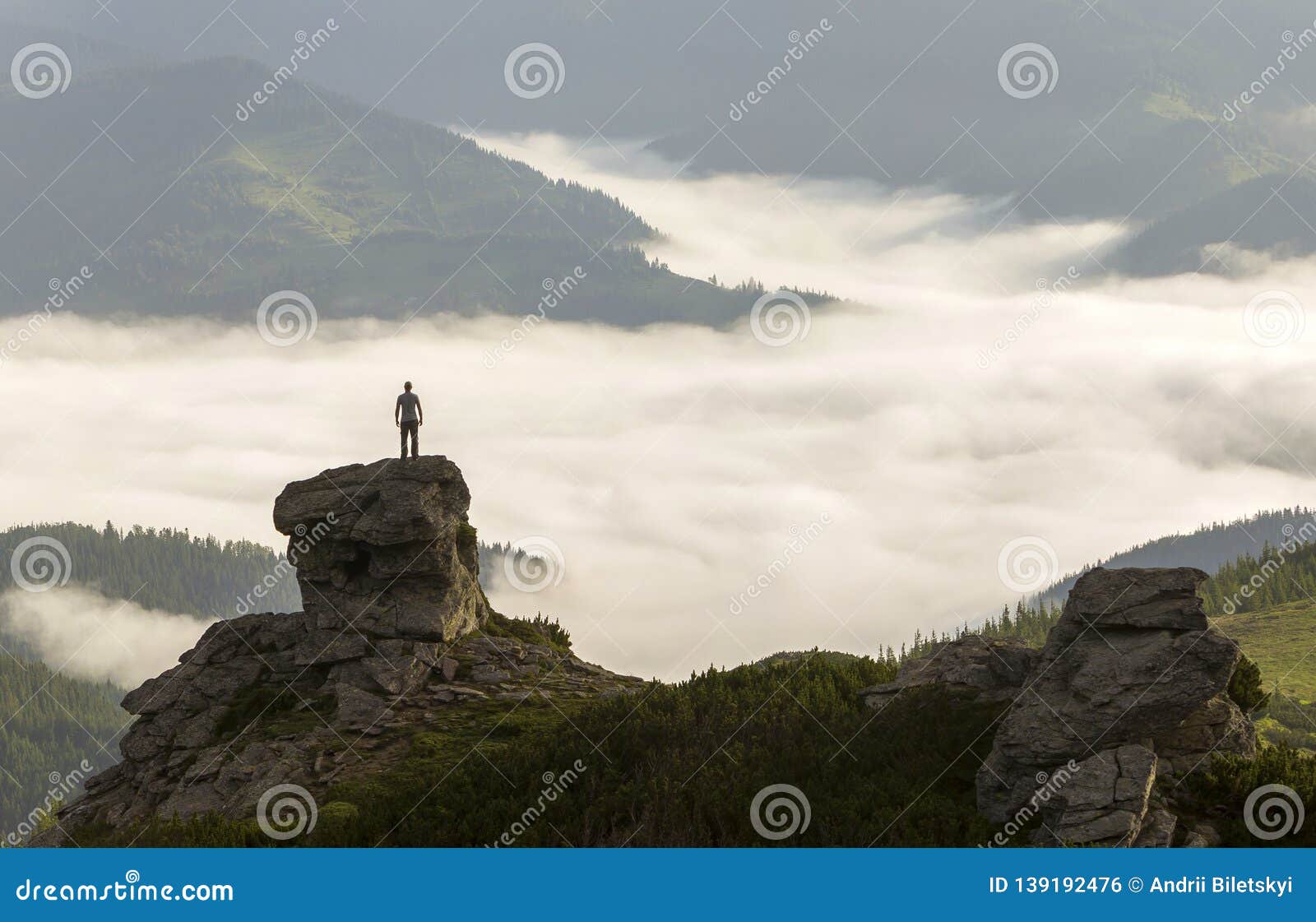 Silhouette of Athletic Climber Tourist on High Rocky Formation on ...