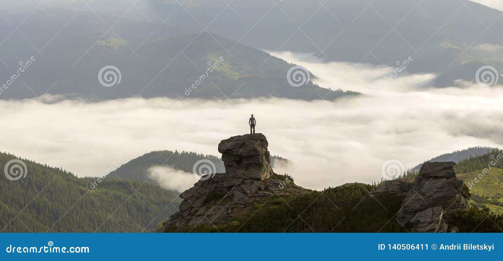 Silhouette of Athletic Climber Tourist on High Rocky Formation on ...