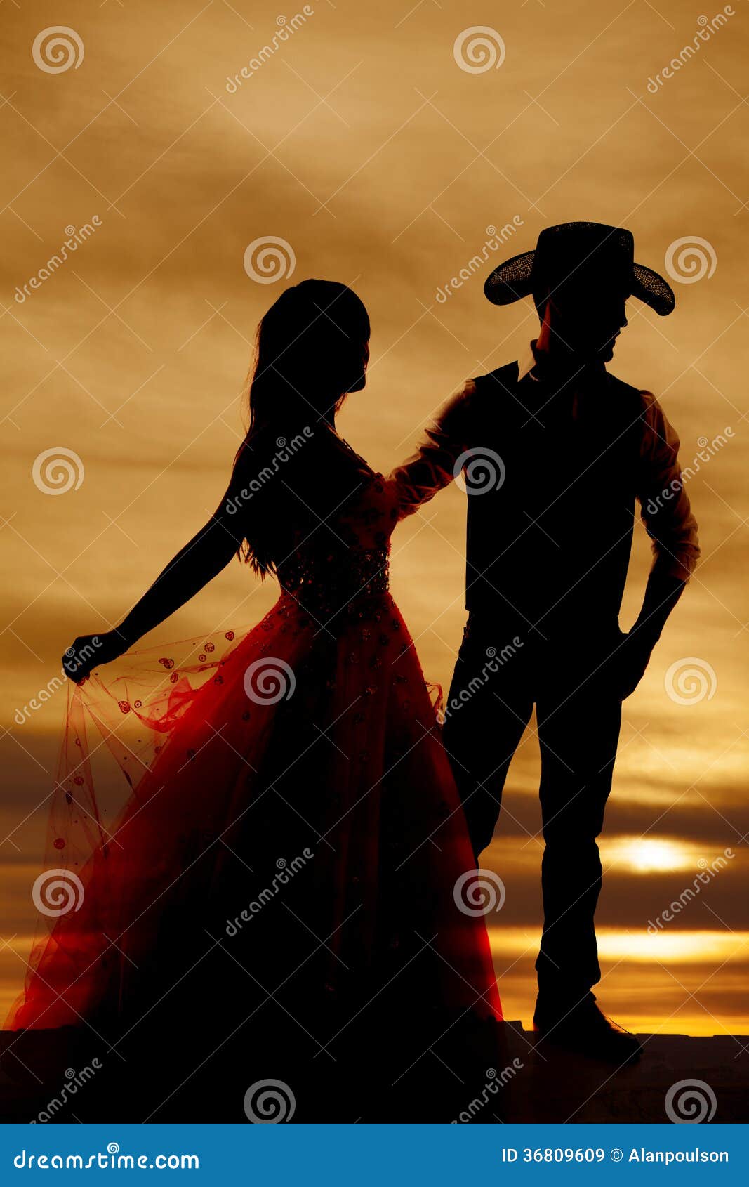 silhouette cowboy and woman in dress