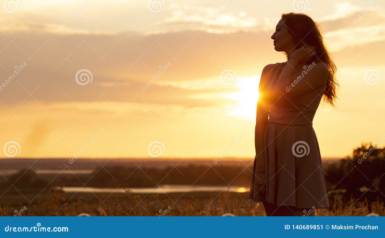 girl in field sunset