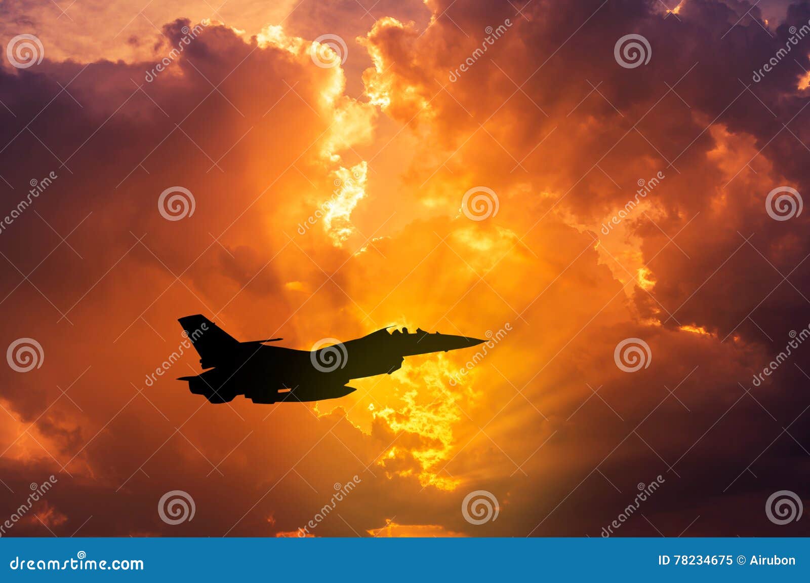 silhouette falcon fighter jet military aircraft flying on sunset