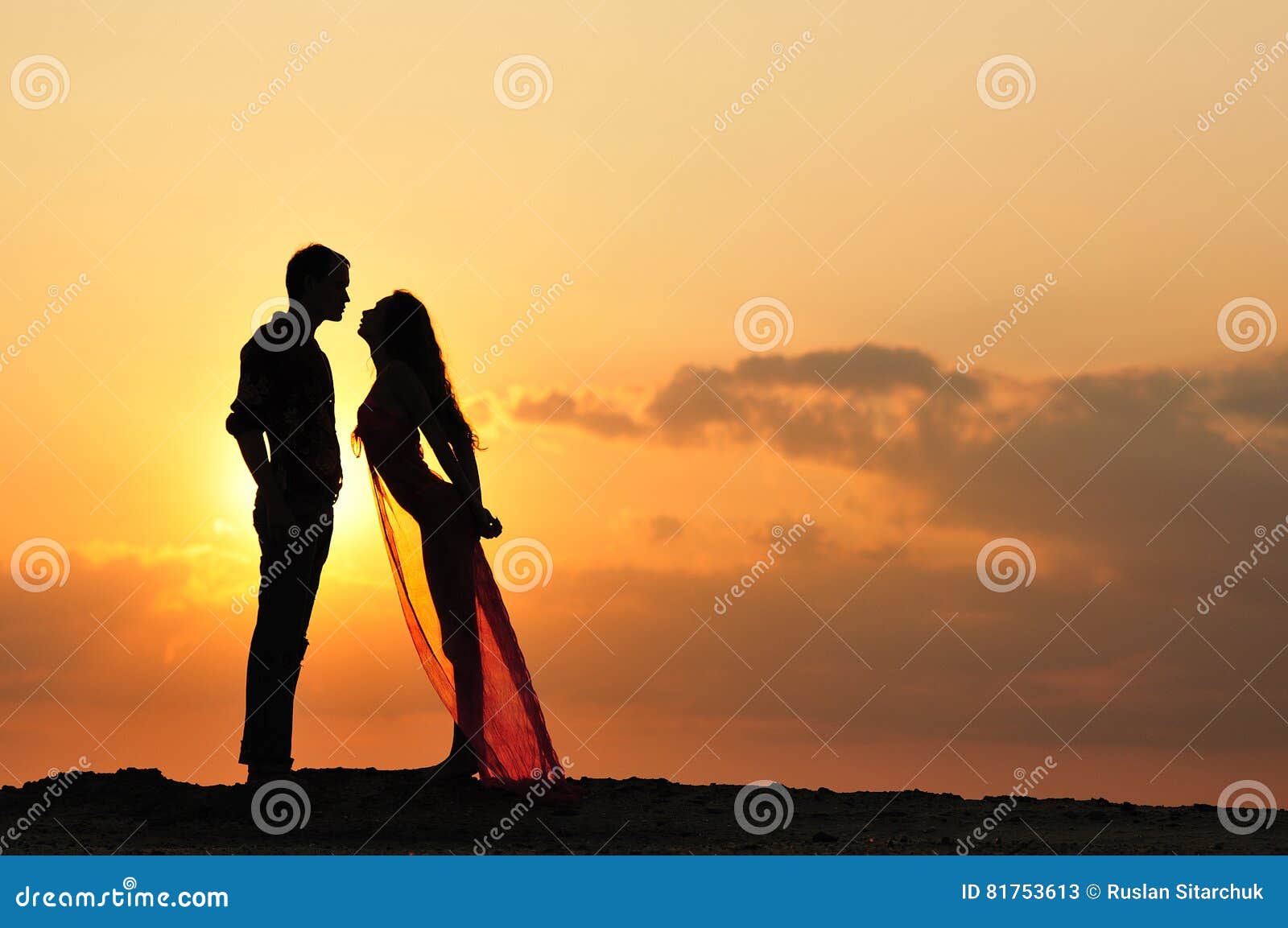 Silhouette Of A Girl And Boy At Sunset Stock Image Image Of Lover Coast
