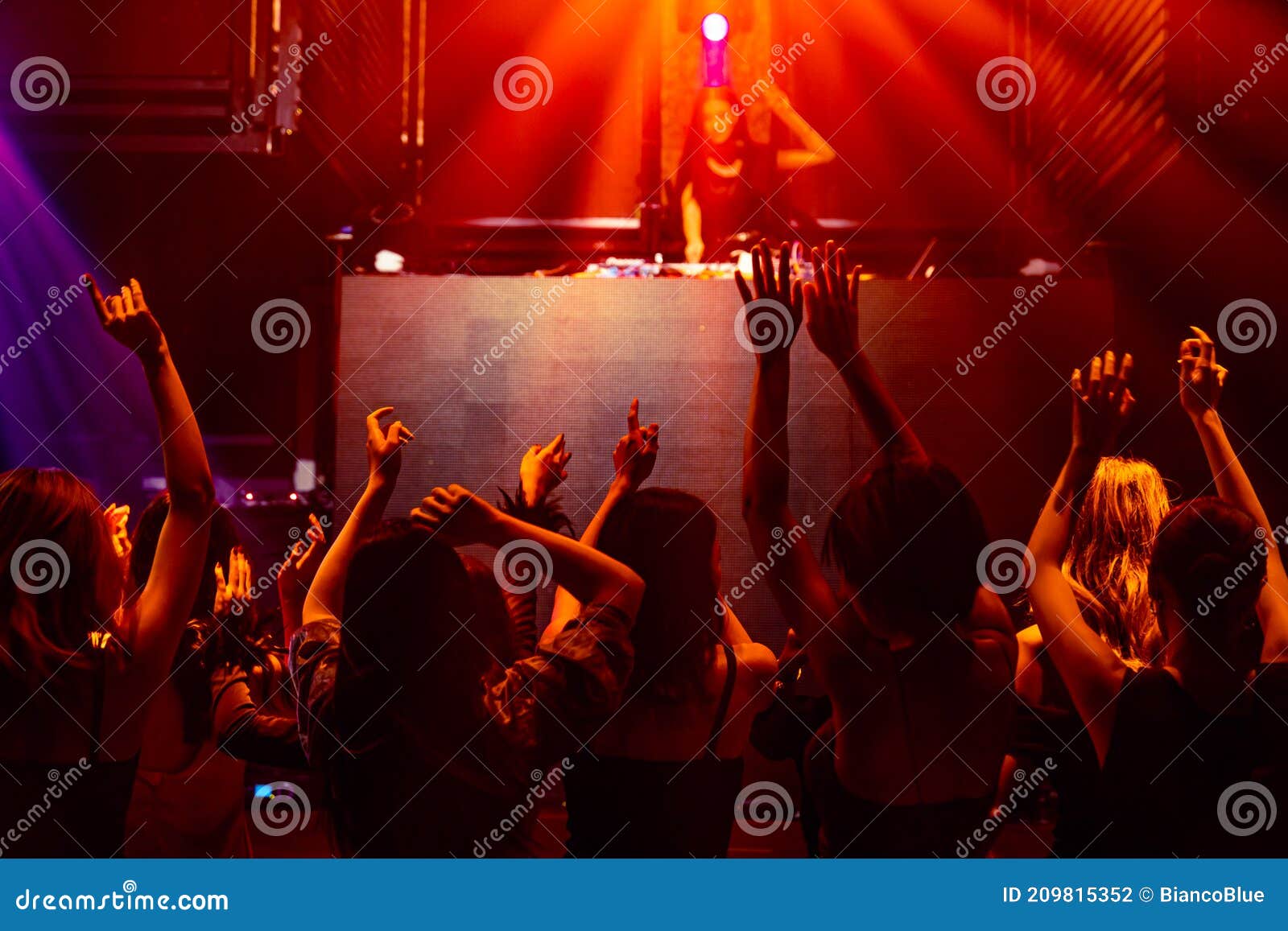 Silhouette Image of People Dance in Disco Night Club To Music from DJ ...
