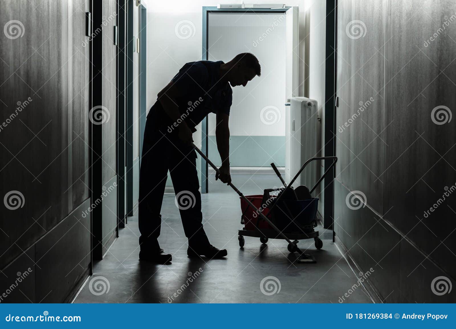 Male Janitor Cleaning Corridor Stock Photo Image of closeup