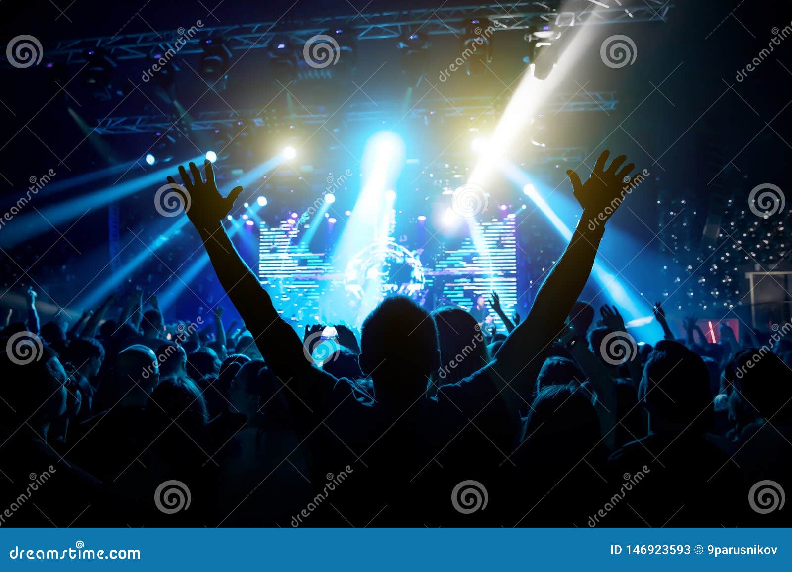 Silhouette of Man with Raised Hands on Music Concert Editorial Stock ...