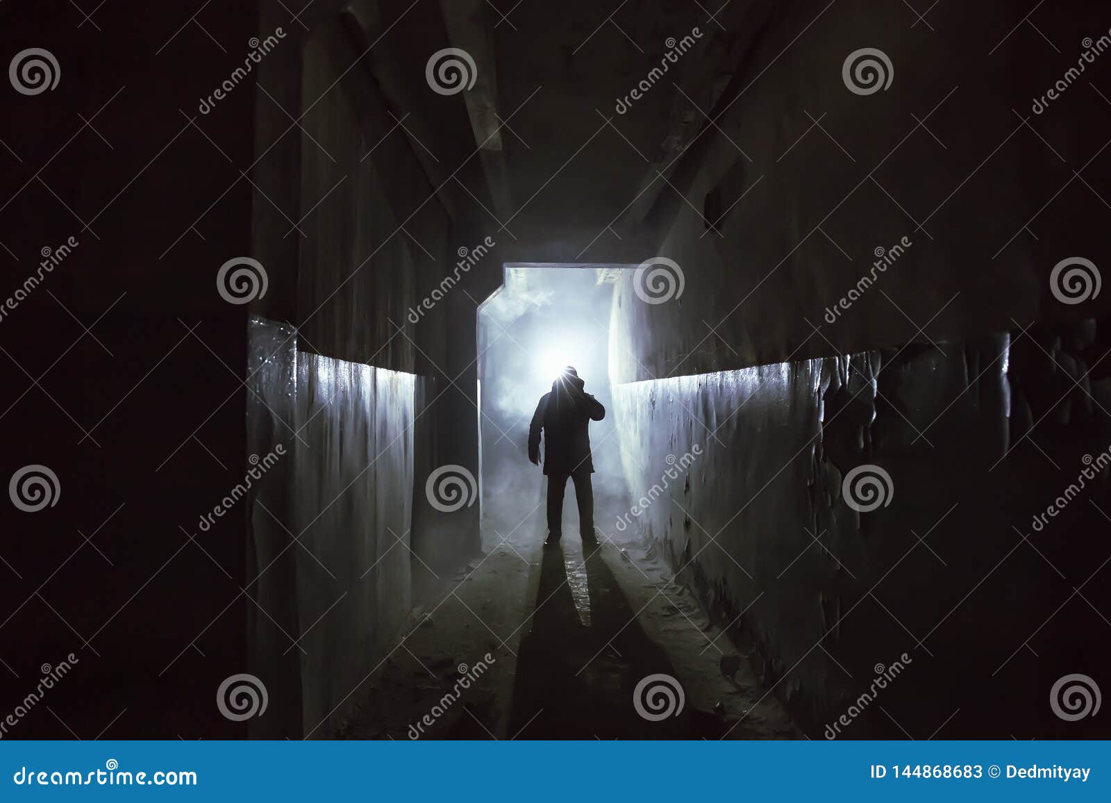 Silhouette Of Man In Standing In Dark Scary Corridor Or Tunnel With ... Silhouette Man Walking Tunnel