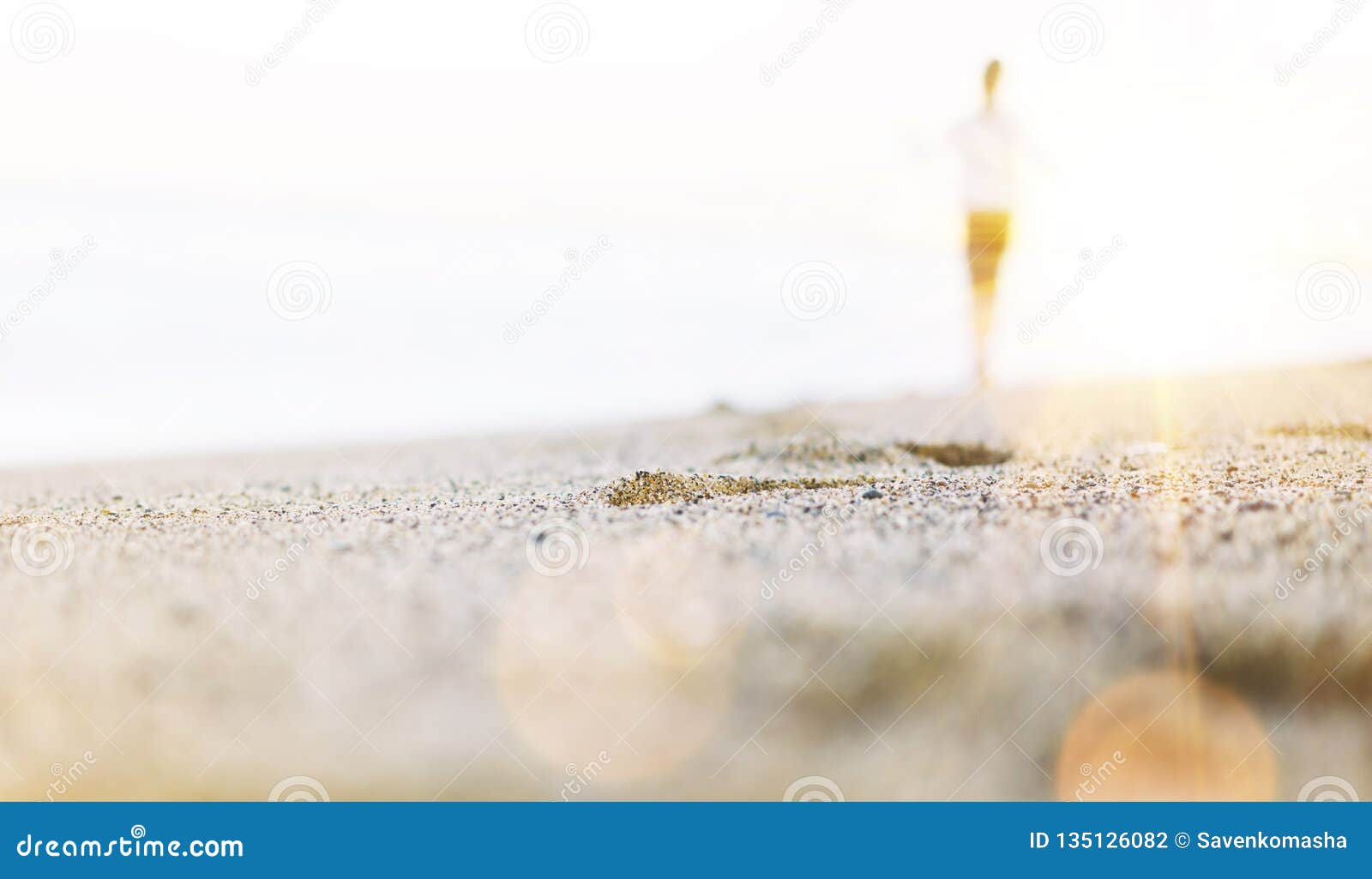 Silhouette of Man Strolling Coastline Beach on Sunny Day Background of ...