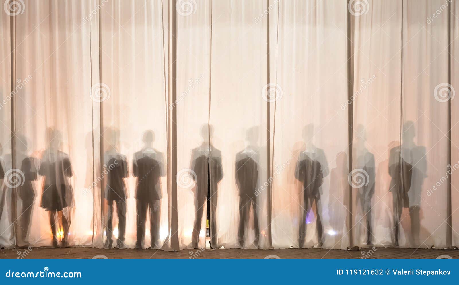 the silhouette of the men behind the curtain in the theater on stage, the shadow behind the scenes is similar to the white and bla