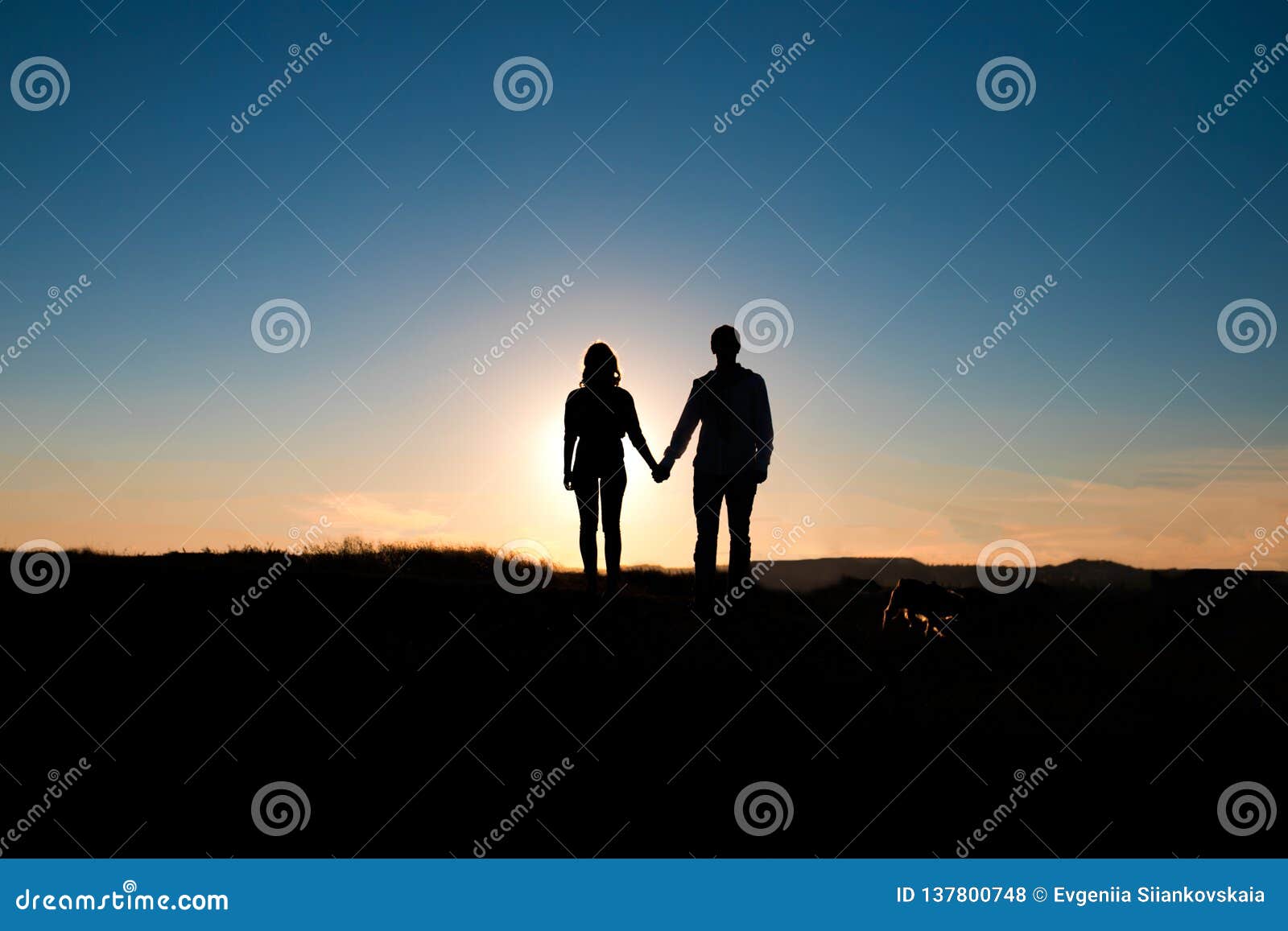 Romantic Couple Hug at Sunset on Background. Stock Photo - Image ...