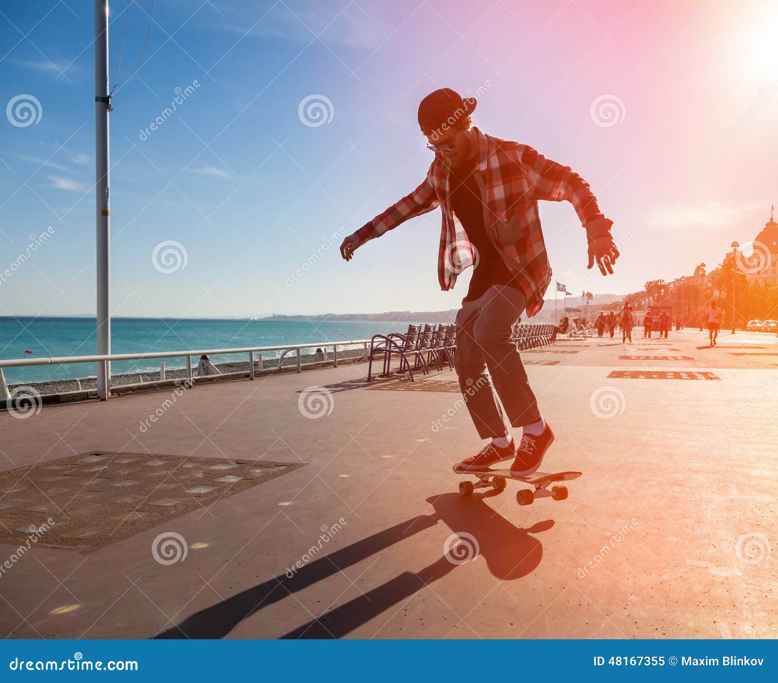 Sunlight over Legs of Person on Skateboard · Free Stock Photo