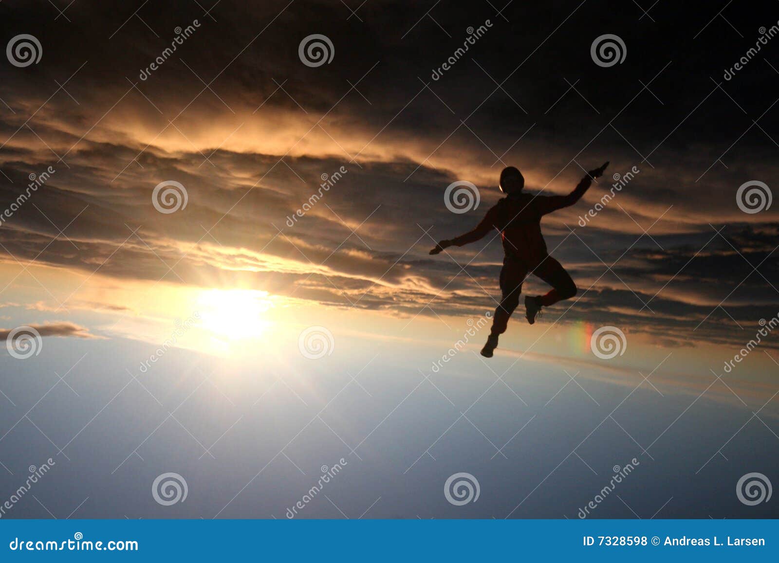silhouette of a skydiver