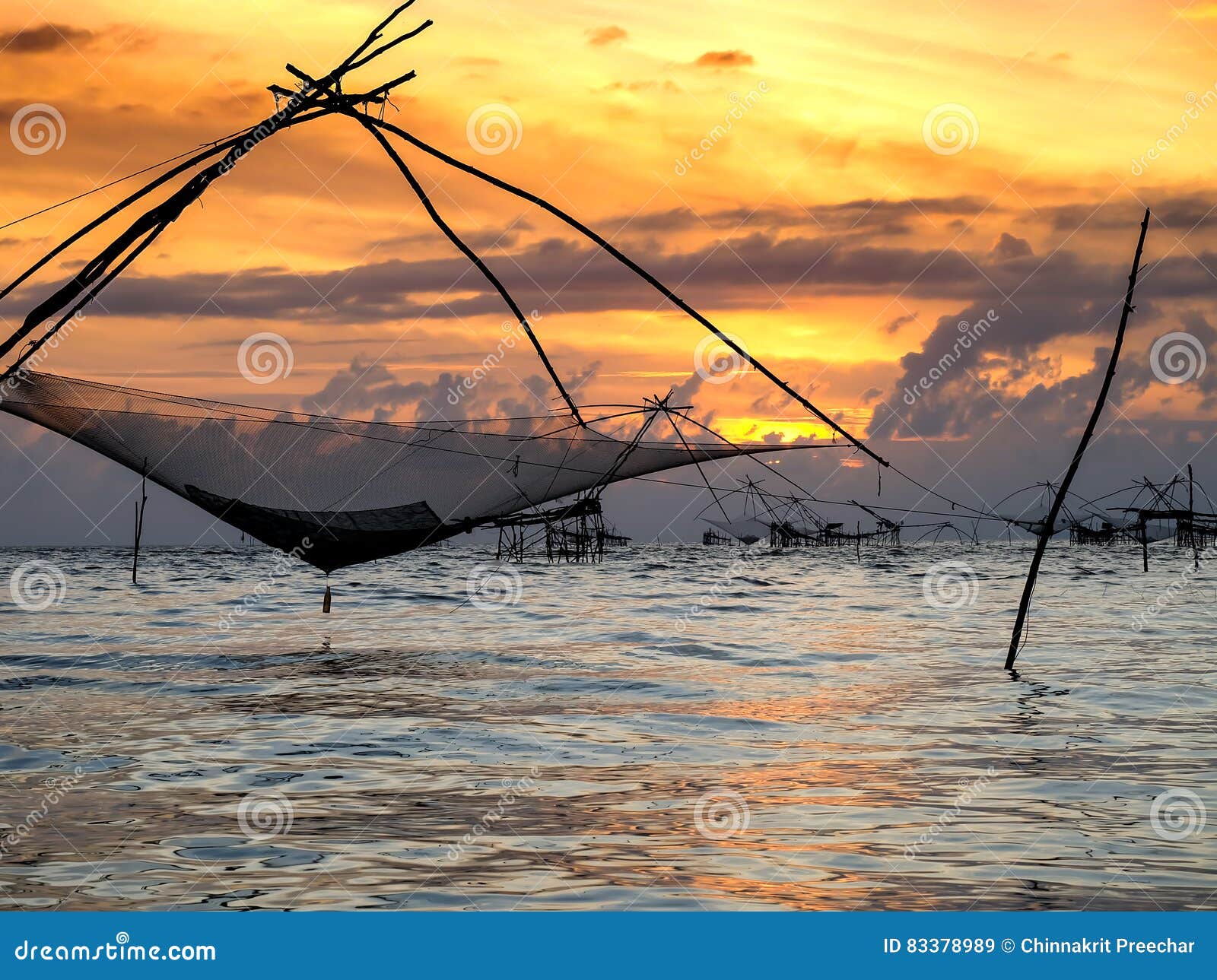 Silhouette of Traditional Fishing Method Using a Bamboo Square Dip Net with  Sunrise Sky Background Stock Image - Image of outdoor, season: 83378989
