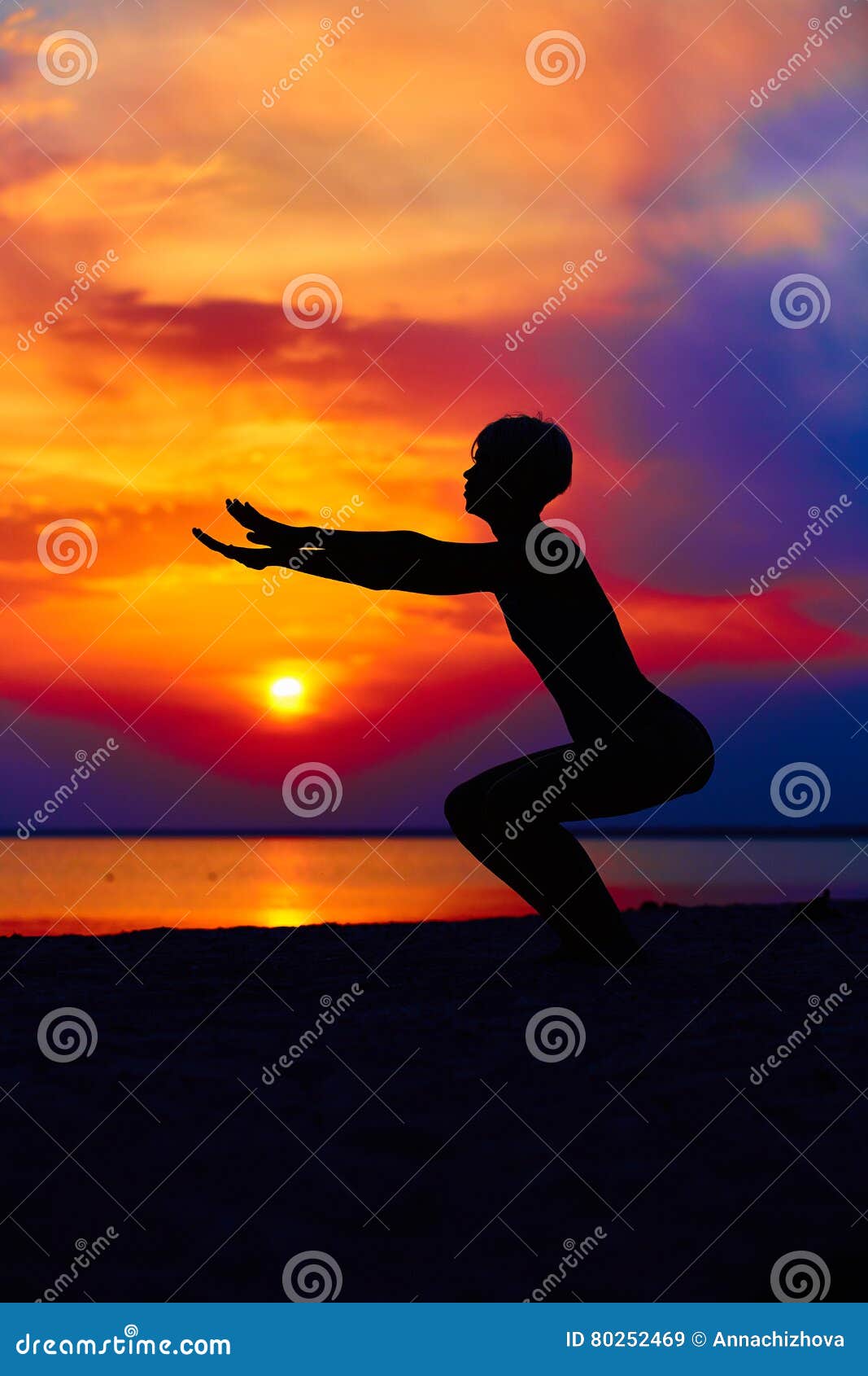 Silhouette Of Woman Standing At Yoga Pose On The Beach During An Amazing  Sunset. Stock Photo, Picture and Royalty Free Image. Image 37897101.