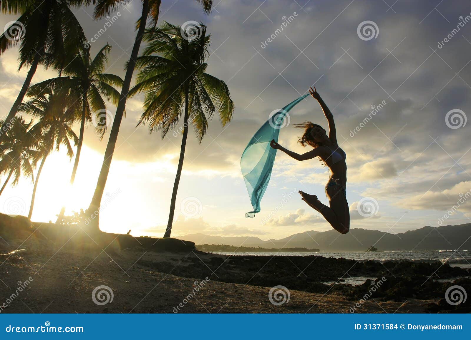 Silhouette of Young Woman Jumping at Las Galeras Beach Stock Photo ...