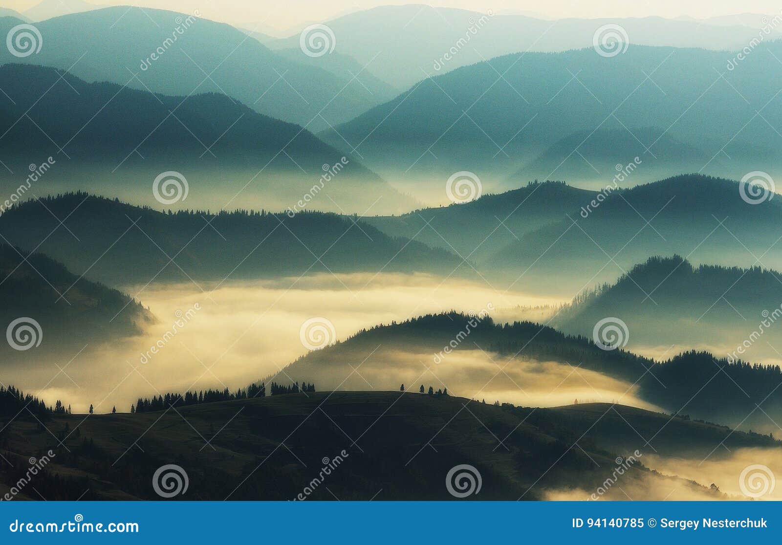 silhouettes of mountains. a misty autumn morning. dawn in the carpathians