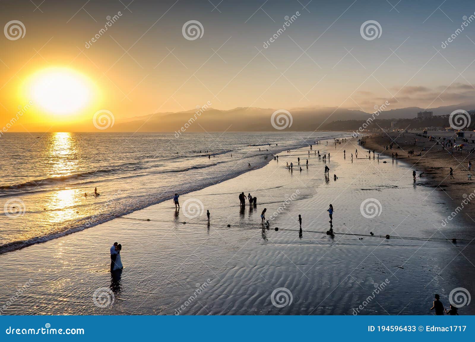 Silhouettes of People Walking on Santa Monica Beach, at Sunset. Stock ...