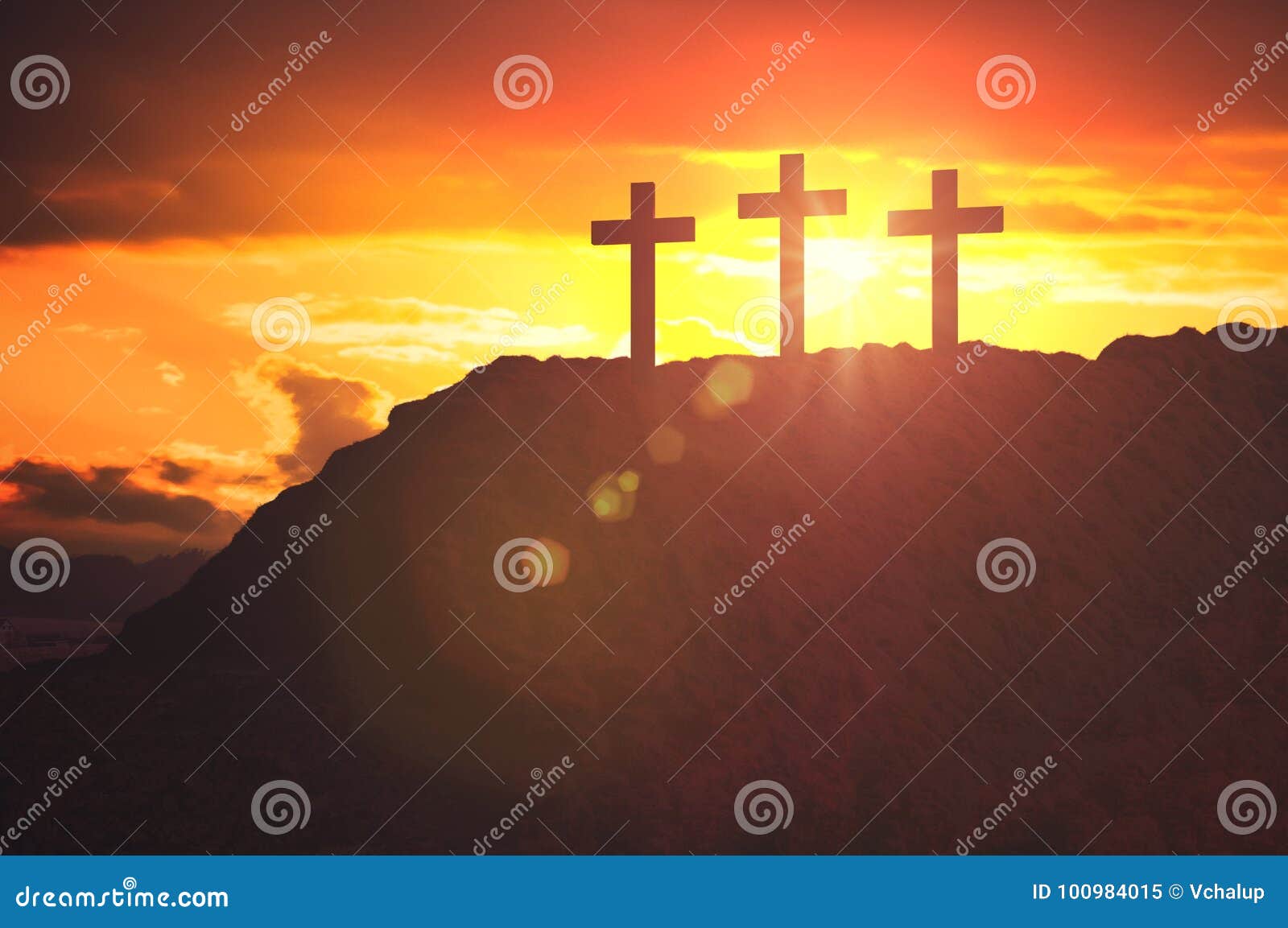 silhouettes of three crosses at sunset on hill. religion and christianity concept