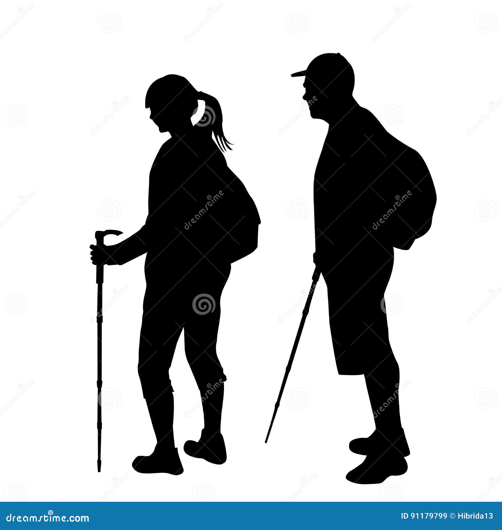 silhouettes of two hikers with backpacks
