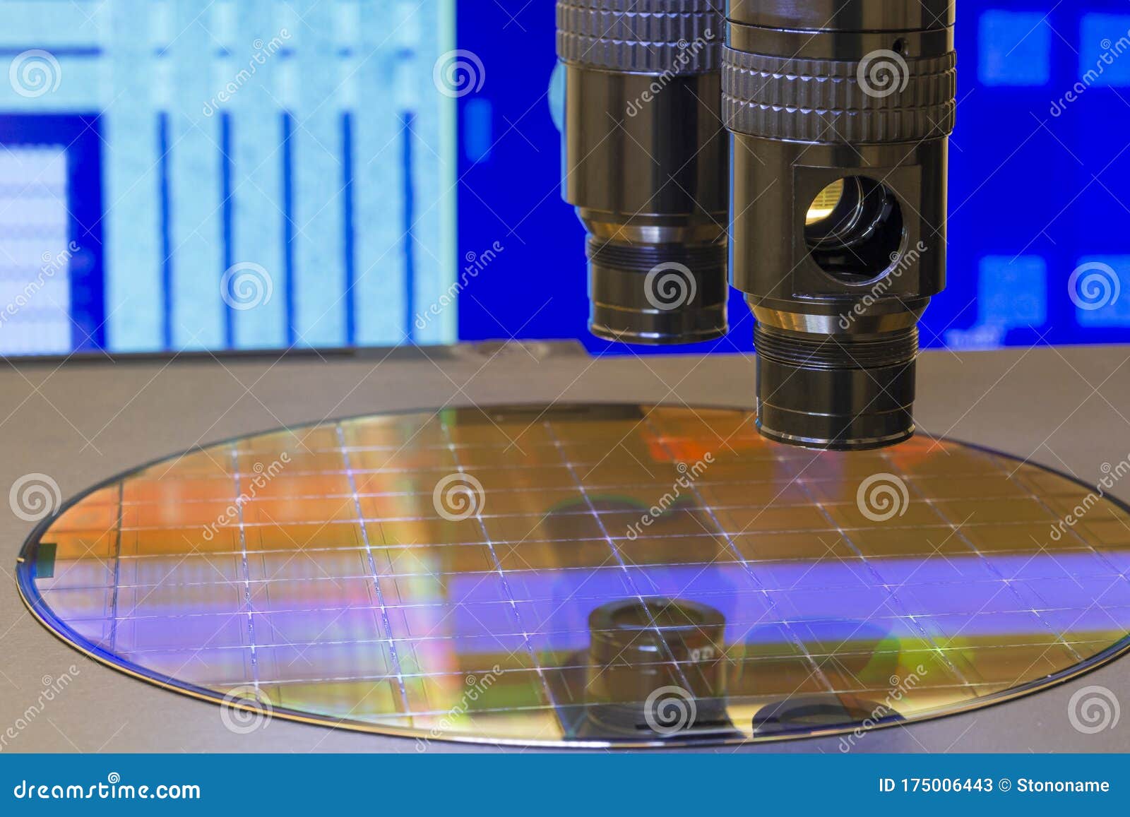 silicon wafer with semiconductor microchip on machine process examining testing in microscope