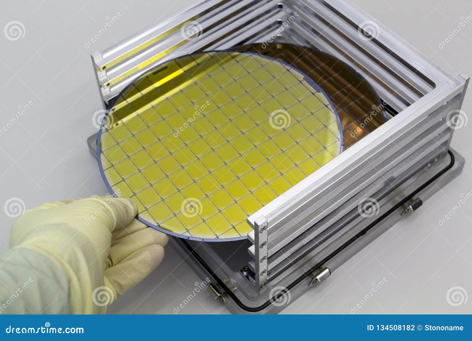 Paving frozen meet Silicon Wafers in Steel Holder Box Take Out by Hand in Gloves- a Wafer is a  Thin Slice of Semiconductor Material, Such As a Stock Photo - Image of  fine, cleanroom: 134508182