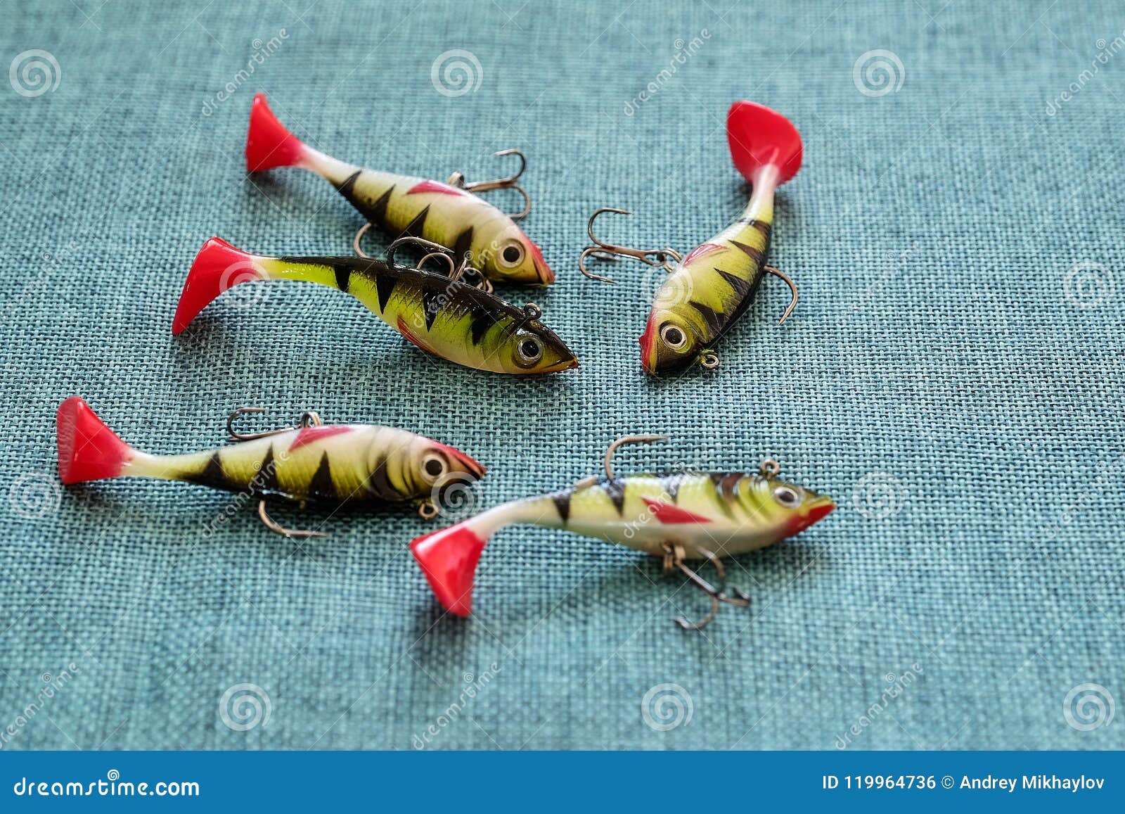 Silicone Bait. Twisters on the Background of Burlap. Lures with