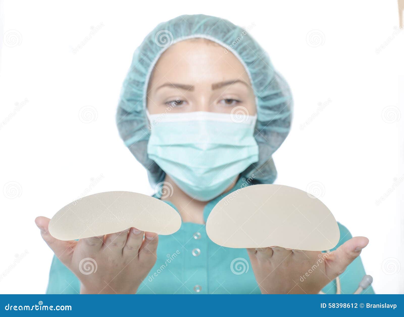 Silicone Breast Implants. Nurse Holding Implants. Doctor Holding